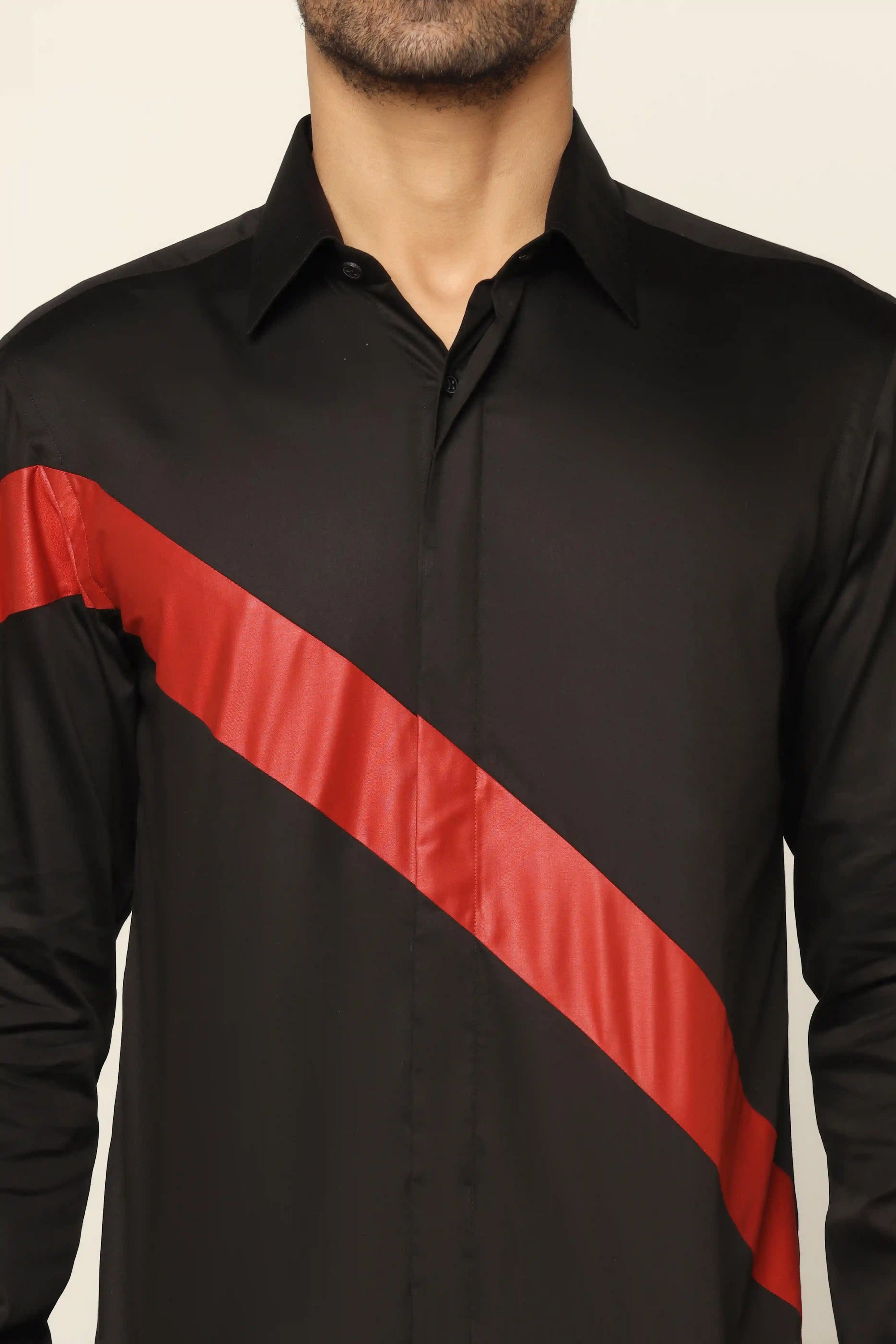 Elevate your style effortlessly with our sleek black designer shirt. Shop Now!