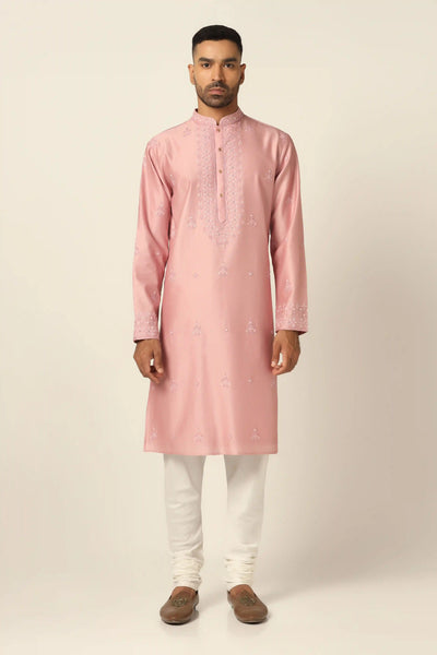Dress in timeless elegance with our Chanderi Silk Kurta set, featuring exquisite thread embroidery throughout. Paired with matching off-white pajamas for a refined ensemble.