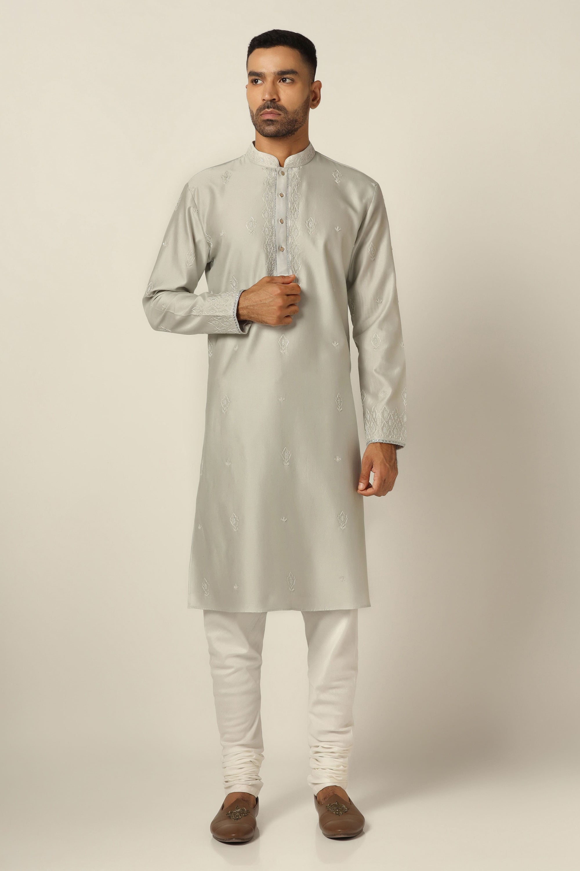 Style with our Chanderi Silk kurta pajama set with intricate thread/machine embroidery. Shop Now!