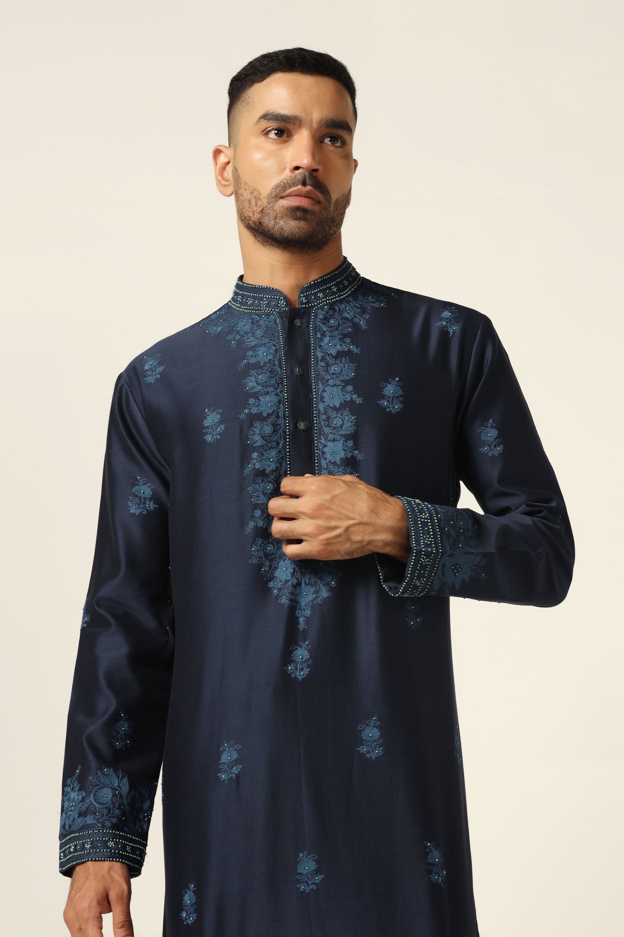 Elevate style with our Chanderi Silk kurta set, adorned with intricate thread embroidery. Shop Now!