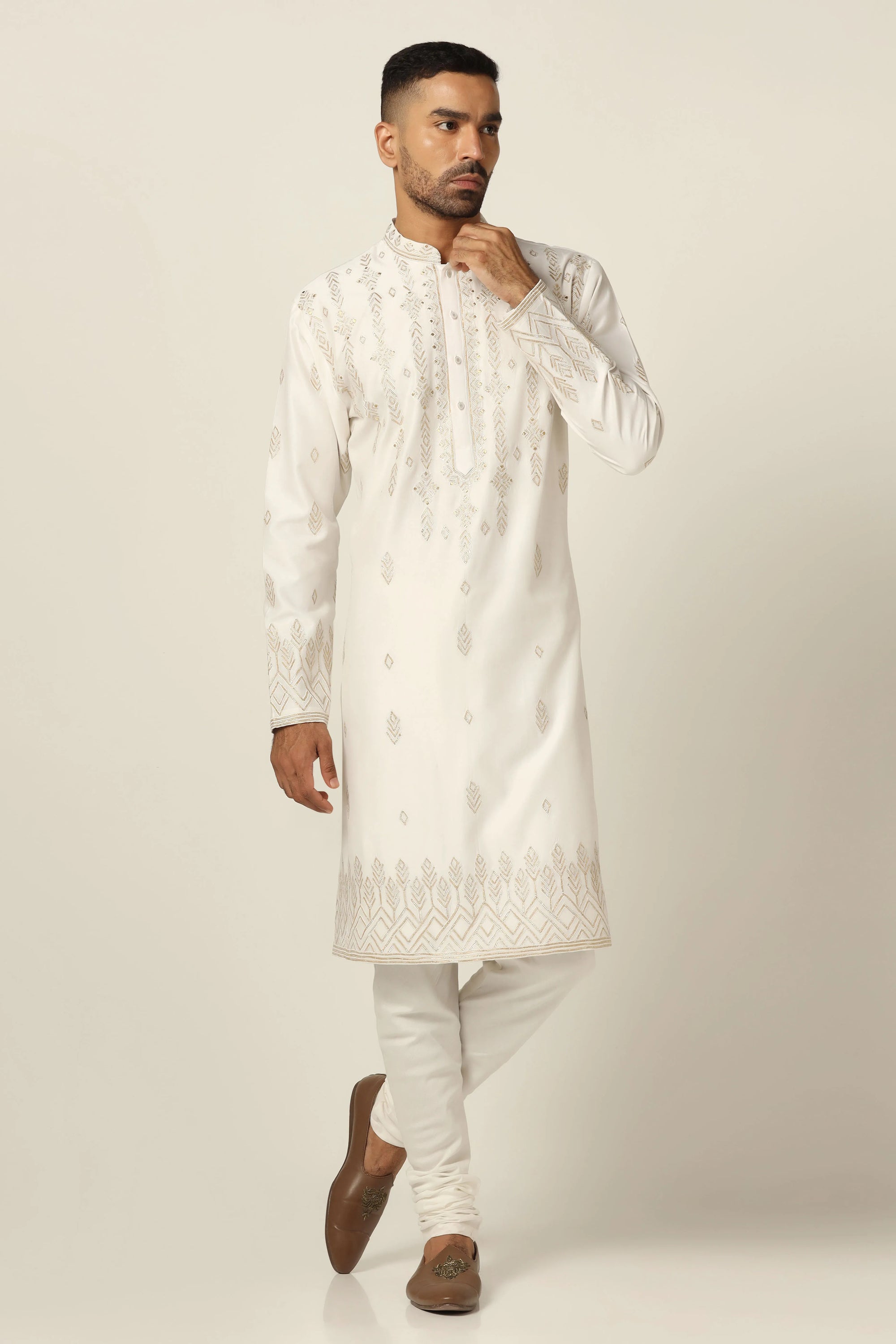 Elevate your ethnic style with this kurta featuring tonal thread embroidery. Shop Now!