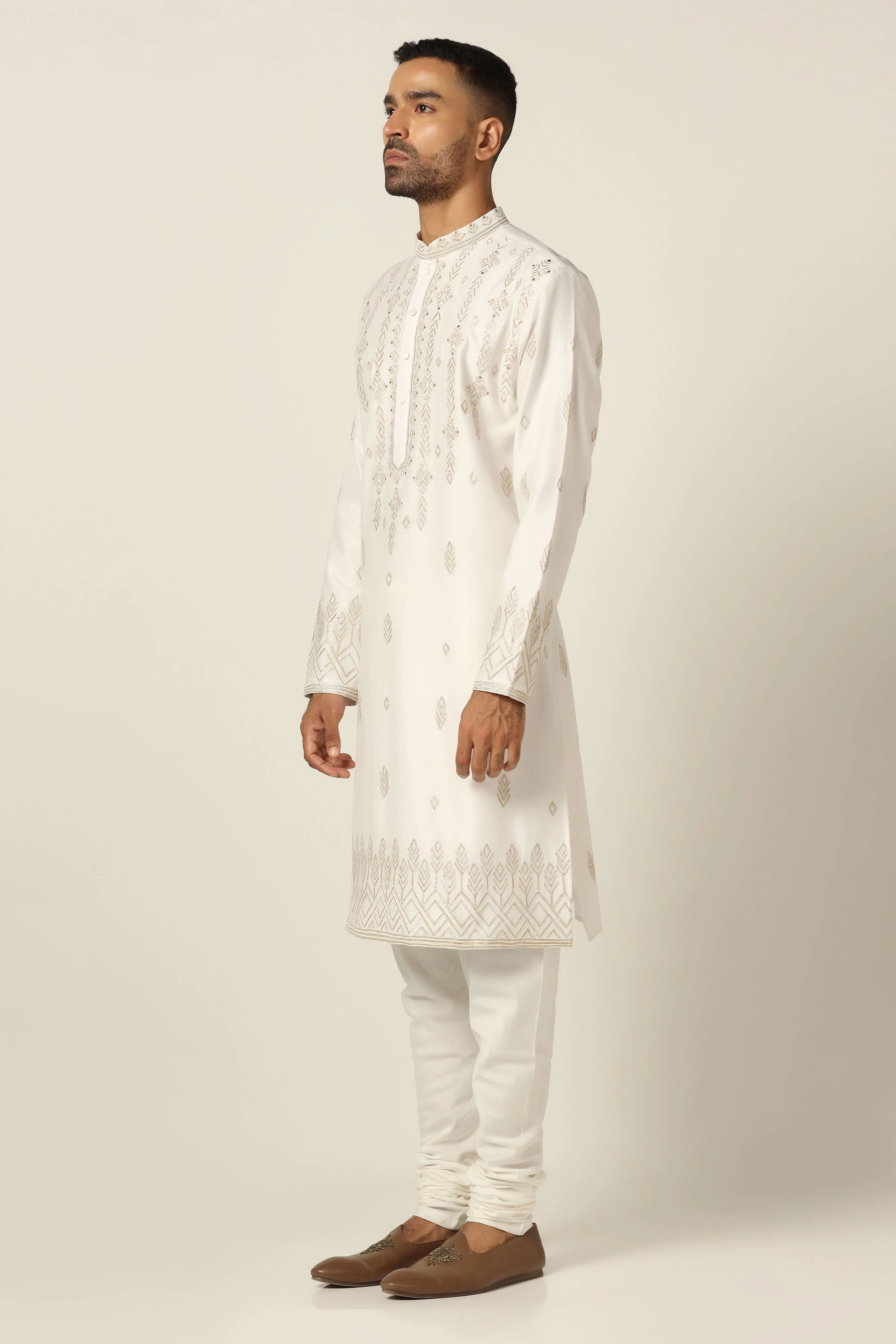 Elevate your ethnic style with this kurta featuring tonal thread embroidery. Shop Now!