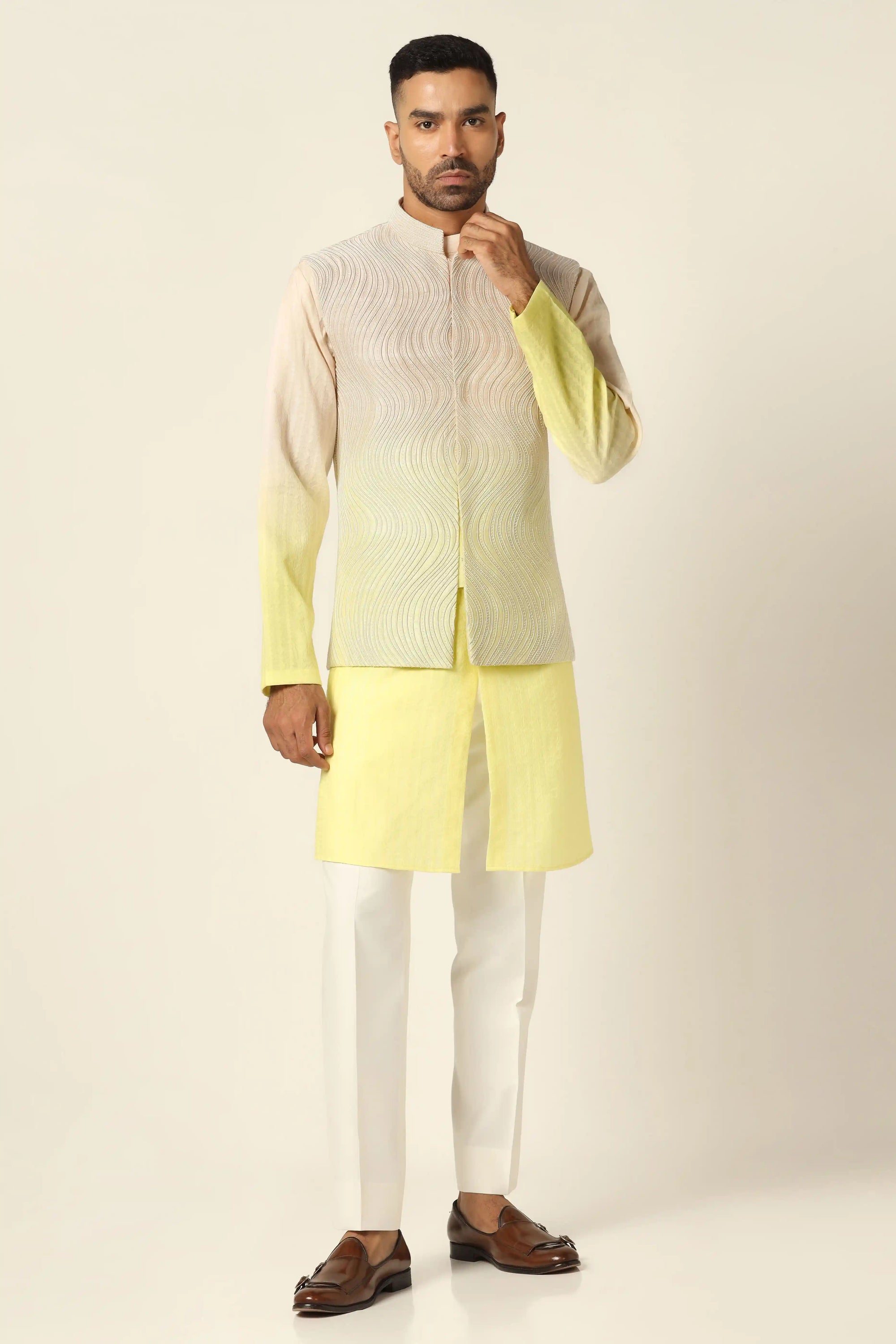 Indulge in elegance with our embroidered Nehru Jacket set, blending yellow and peach hues. Shop Now!