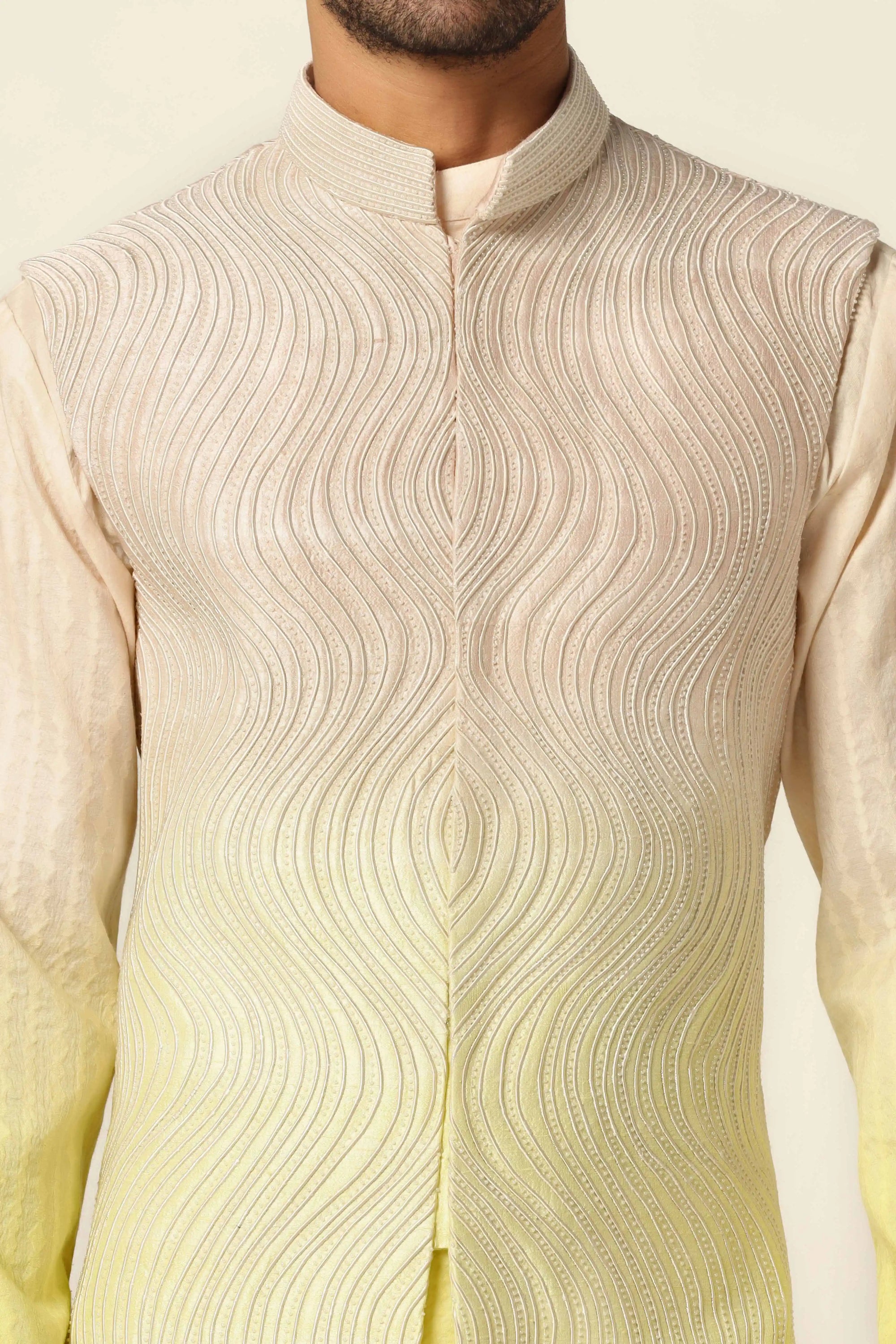 Indulge in elegance with our embroidered Nehru Jacket set, blending yellow and peach hues. Shop Now!