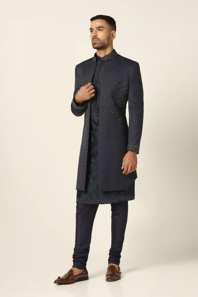 Elevate your style with our raw silk Indo-western set, adorned with intricate machine embroidery throughout. Paired perfectly with a matching Kurta for a timeless ensemble.