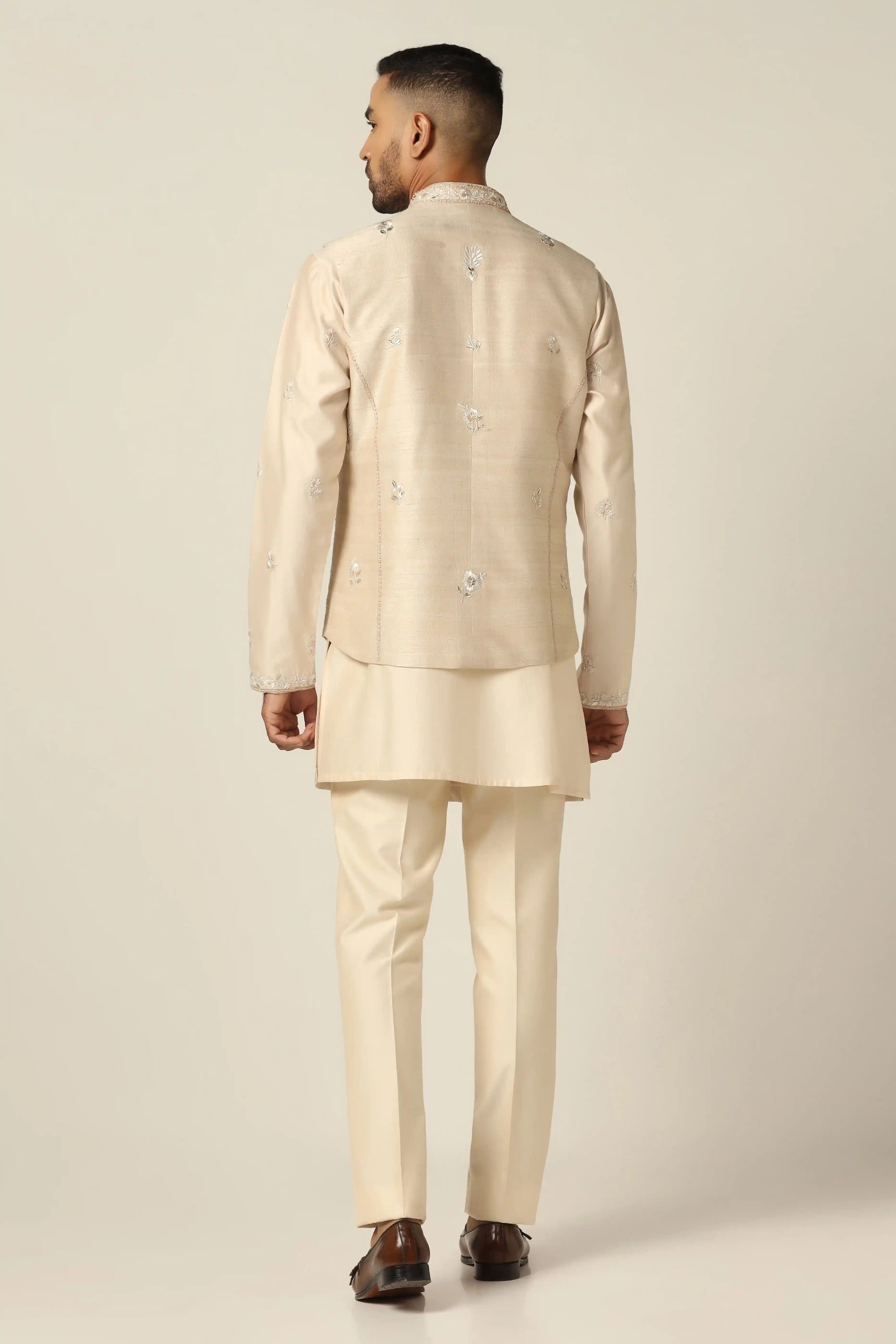 Experience classic elegance with Off-white Nehru Jacket Set. Shop Now!