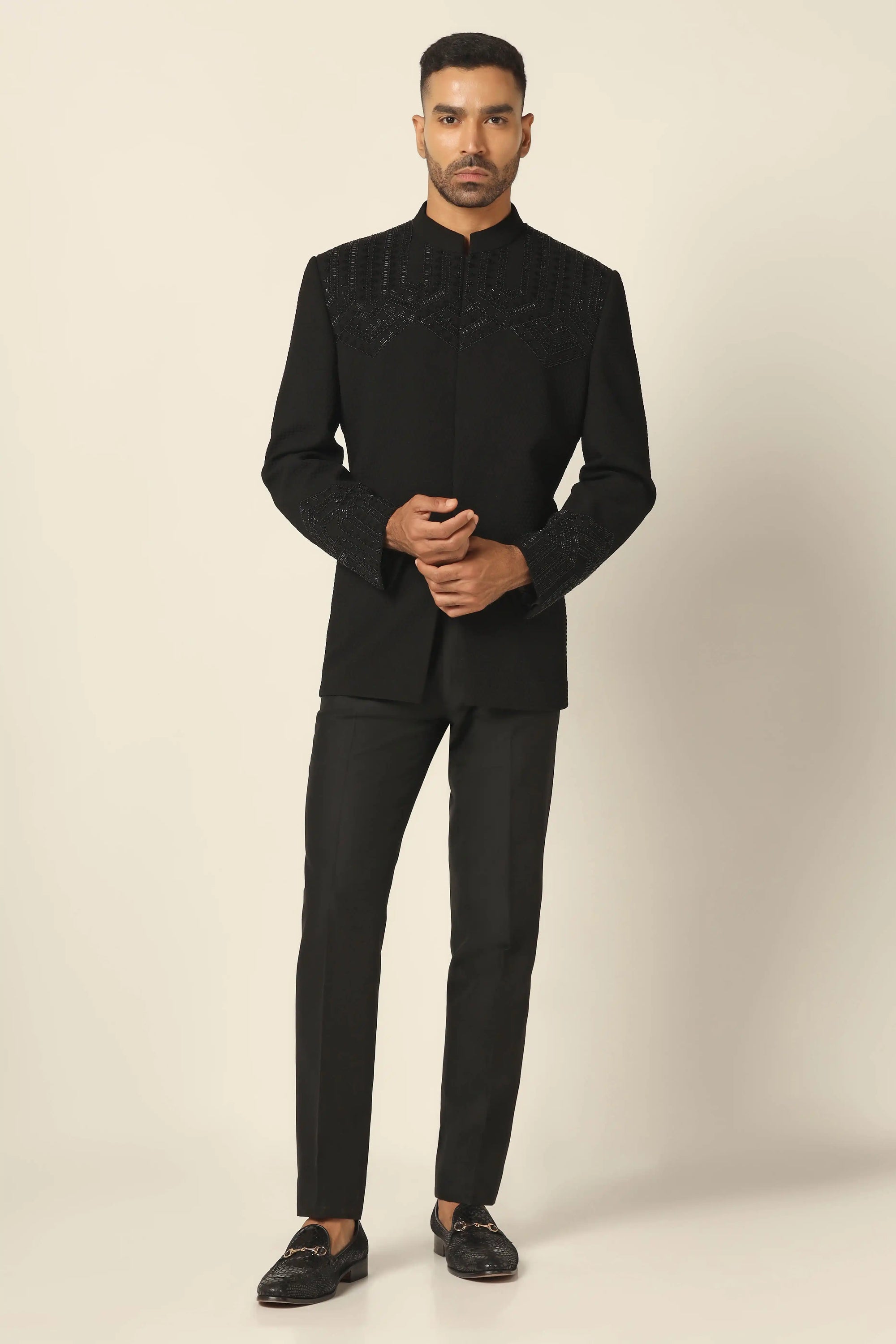 Step into luxury with a black embroidered bandhgala suit, designed for timeless style. Shop now!