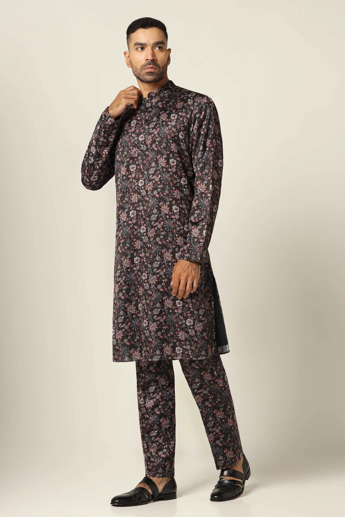 Elegance meets tradition in our soft printed silk set. The kurta, with its classic cut, is paired with comfortable trouser pajamas for timeless style.