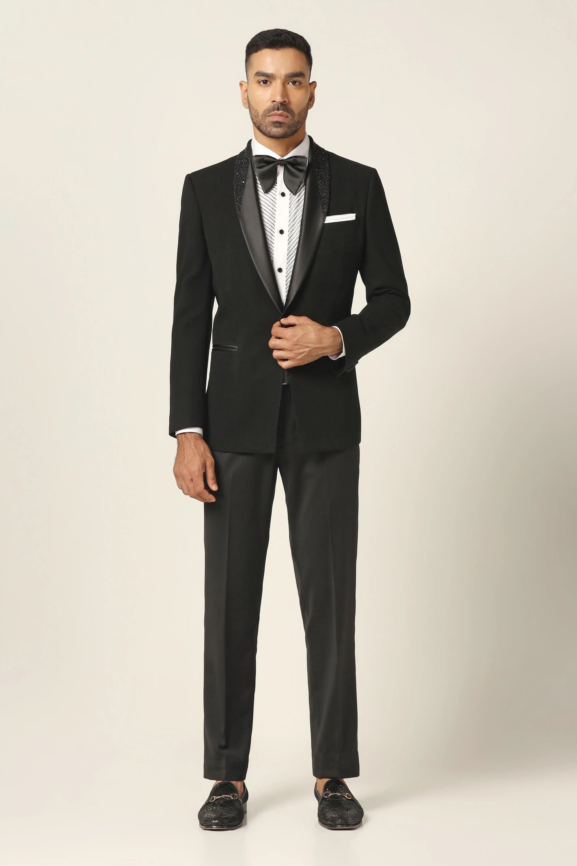 Distinguished elegance in our Navy Tuxedo. Satin shawl collar with subtle embroidery. Shop Now!