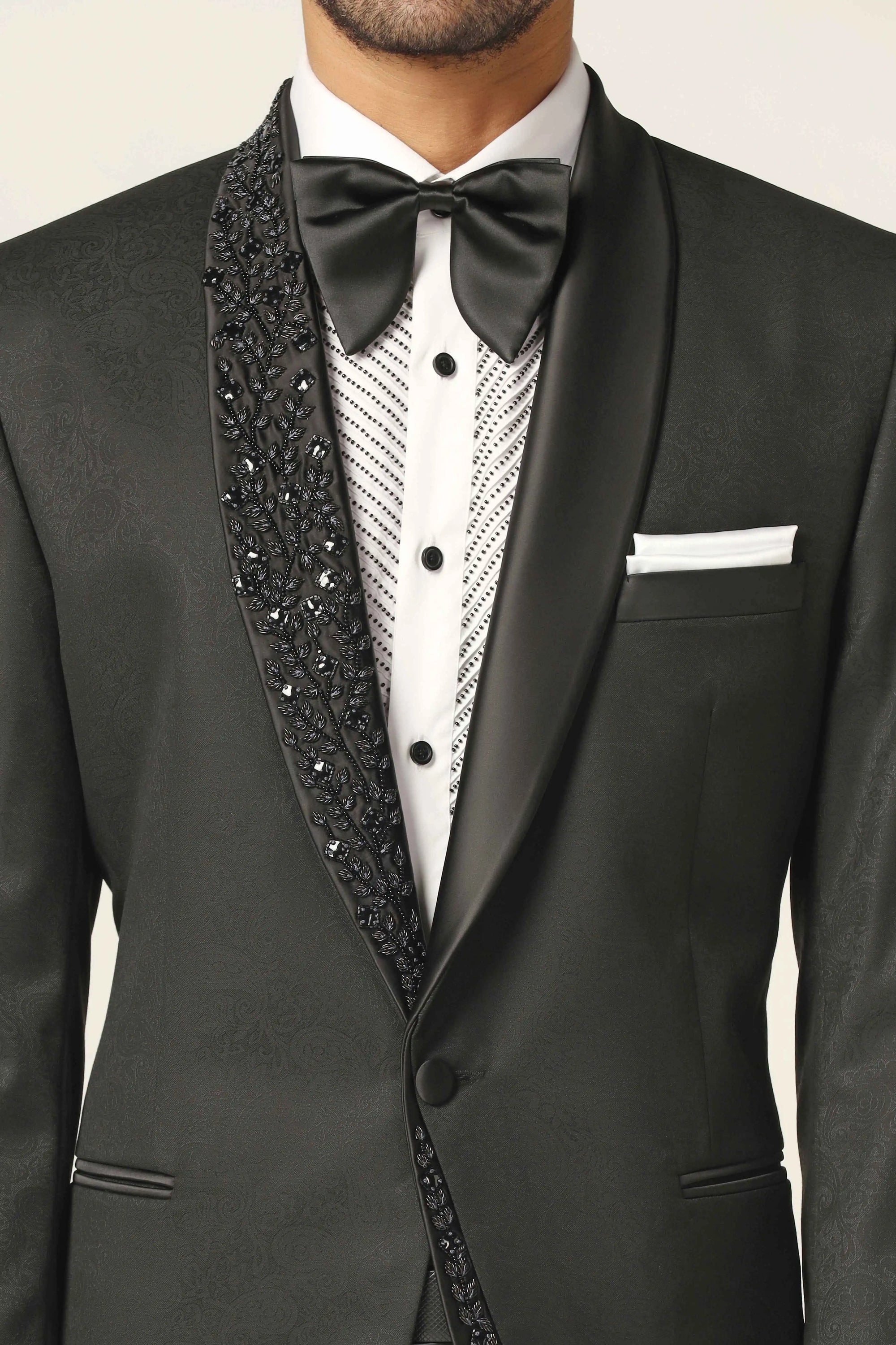 A navy tuxedo with exquisite embroidery to make every occasion special. Shop Now!
