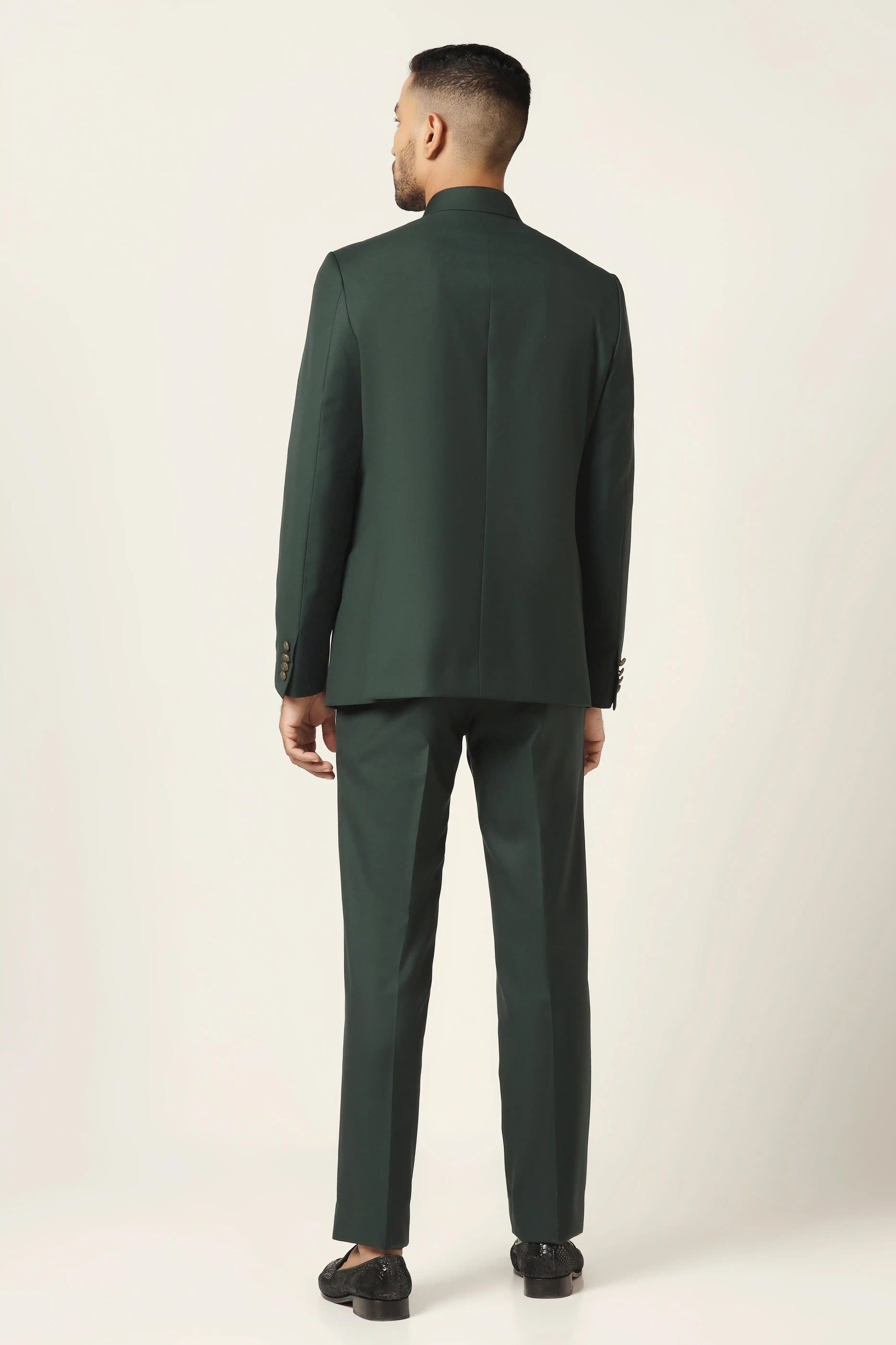 Embrace sophistication with a green bandhgala suit, designed for the modern men. Shop Now!