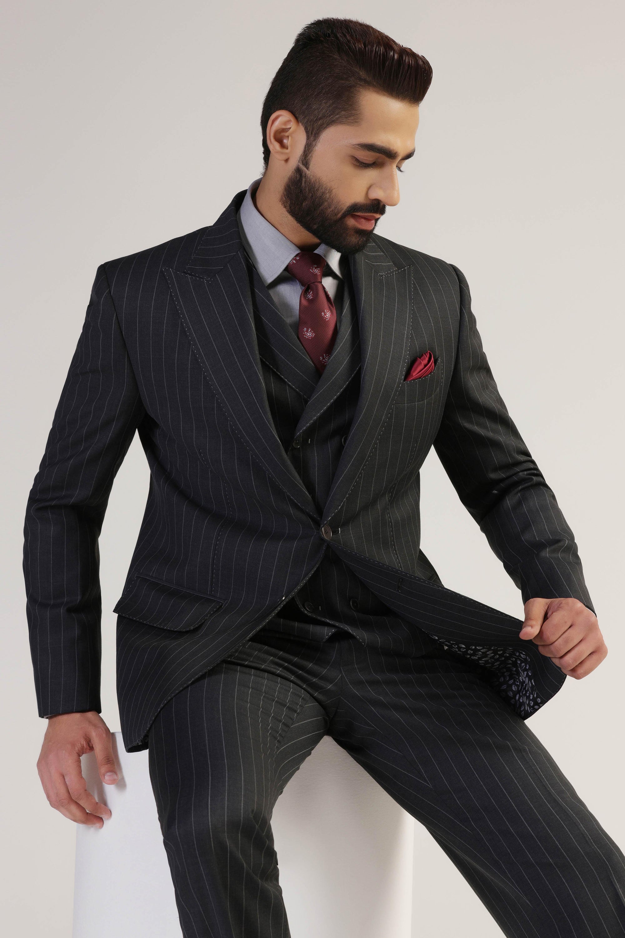 Upgrade your professional attire with our Grey Pinstripe Suit. Shop Now!