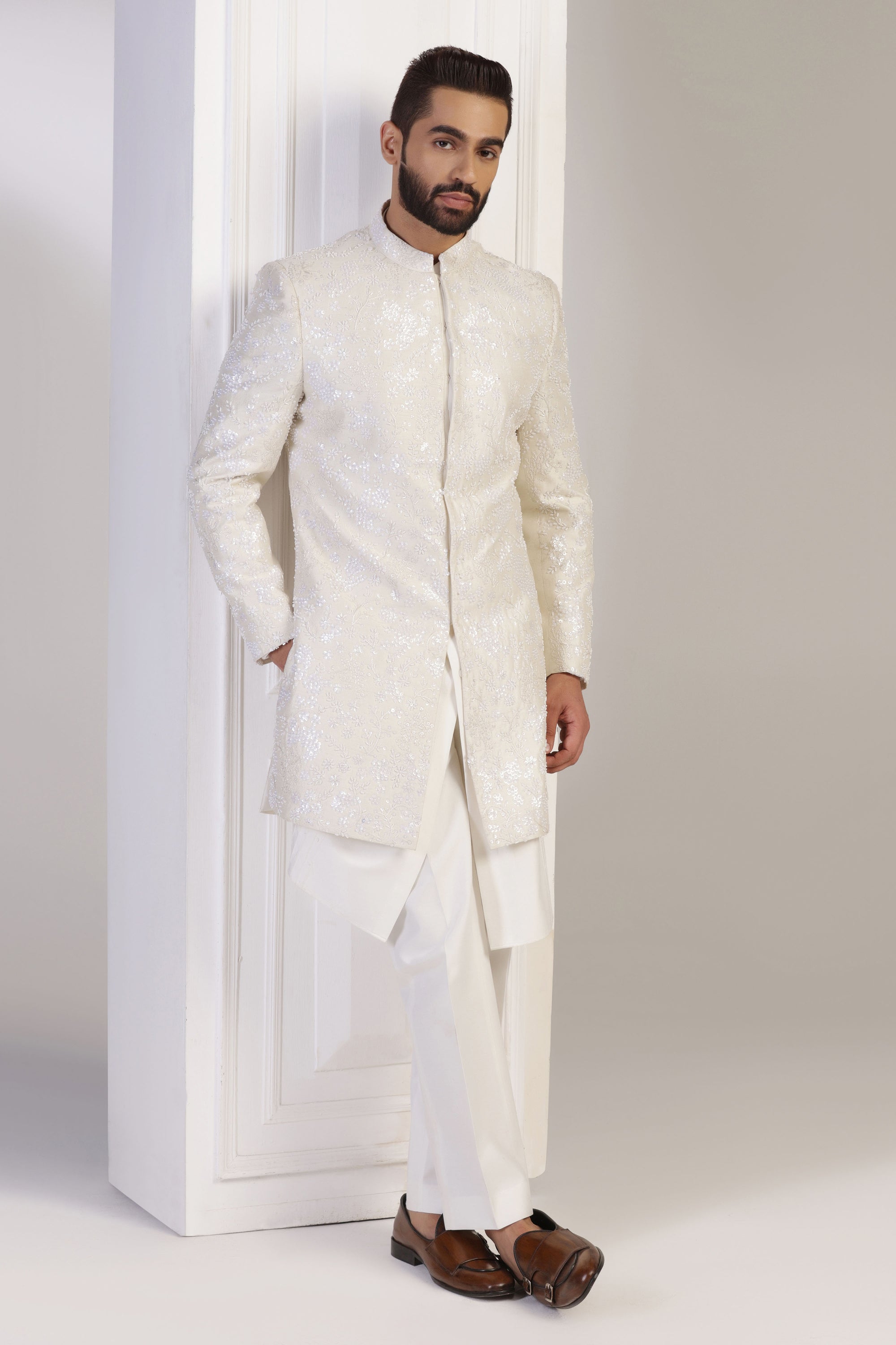 Experience the blend of traditional and modern with our Ivory Embroidered Indowestern! Shop Now!