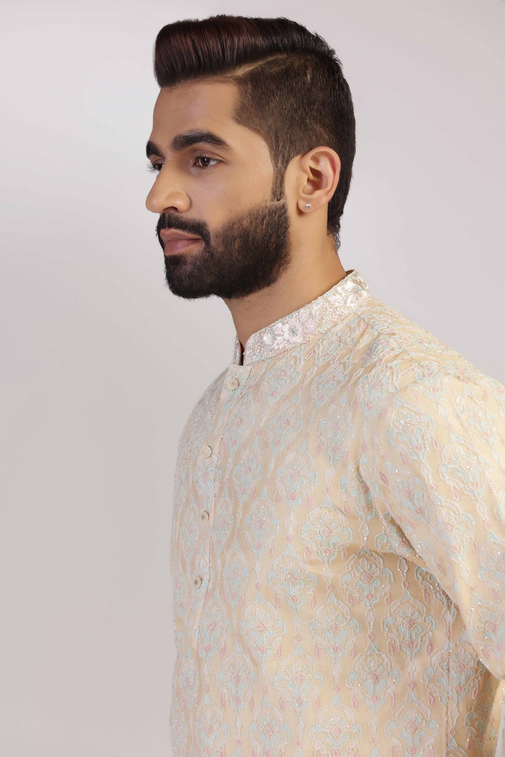 This Yellow Multicolour Kurta Pajama is made from luxurious silk fabric. Shop Now!