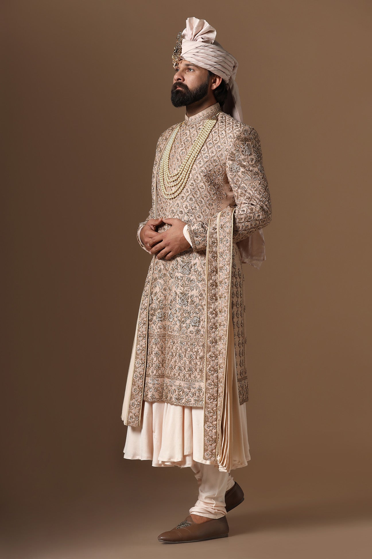 Experience our best sherwani, adorned with captivating floral and geometric embroidery. Shop Now!