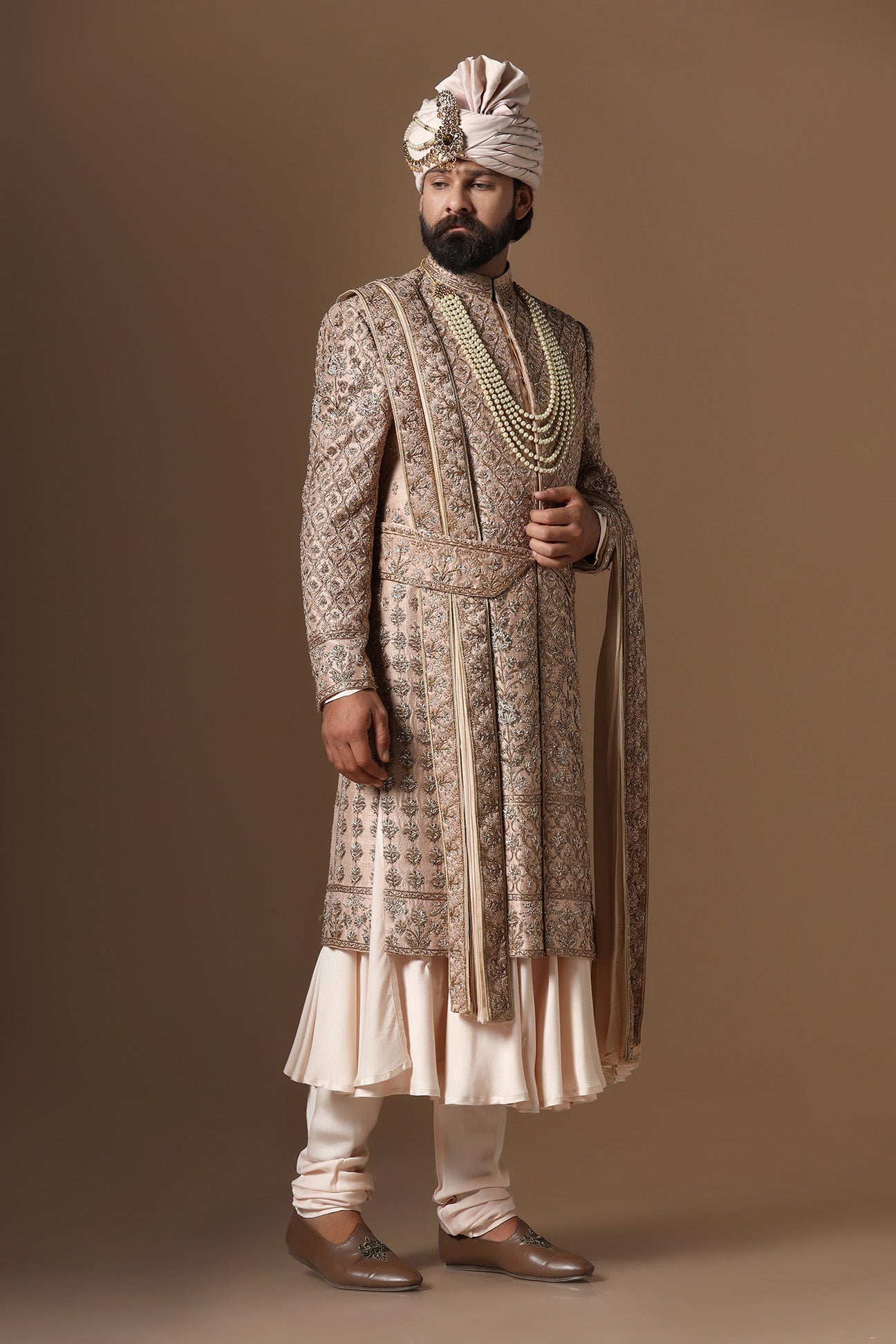 Experience our best sherwani, adorned with captivating floral and geometric embroidery. Shop Now!