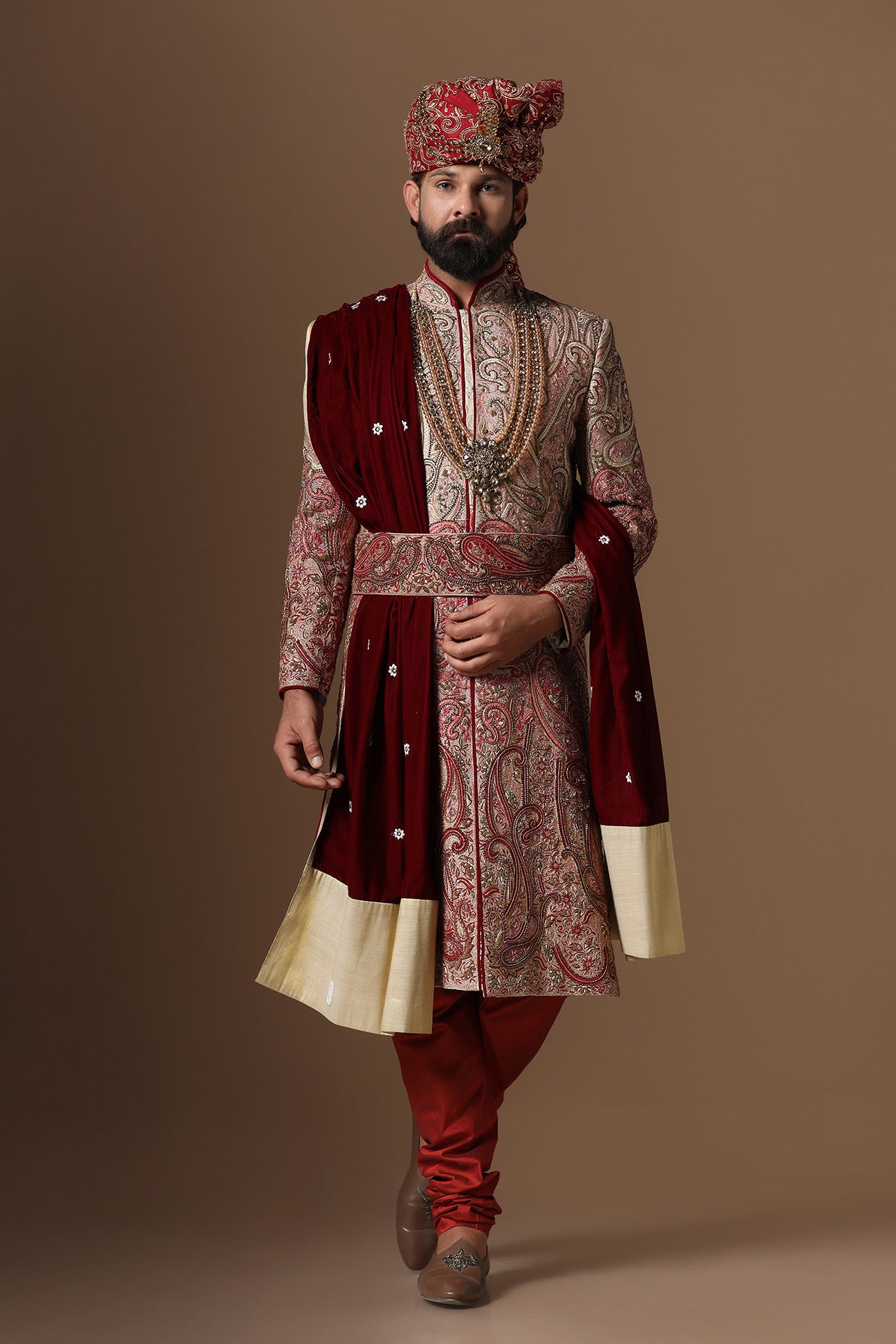 Elevate your style with our ombre embroidered Sherwani, merging Beige and Maroon tones. Shop Now!