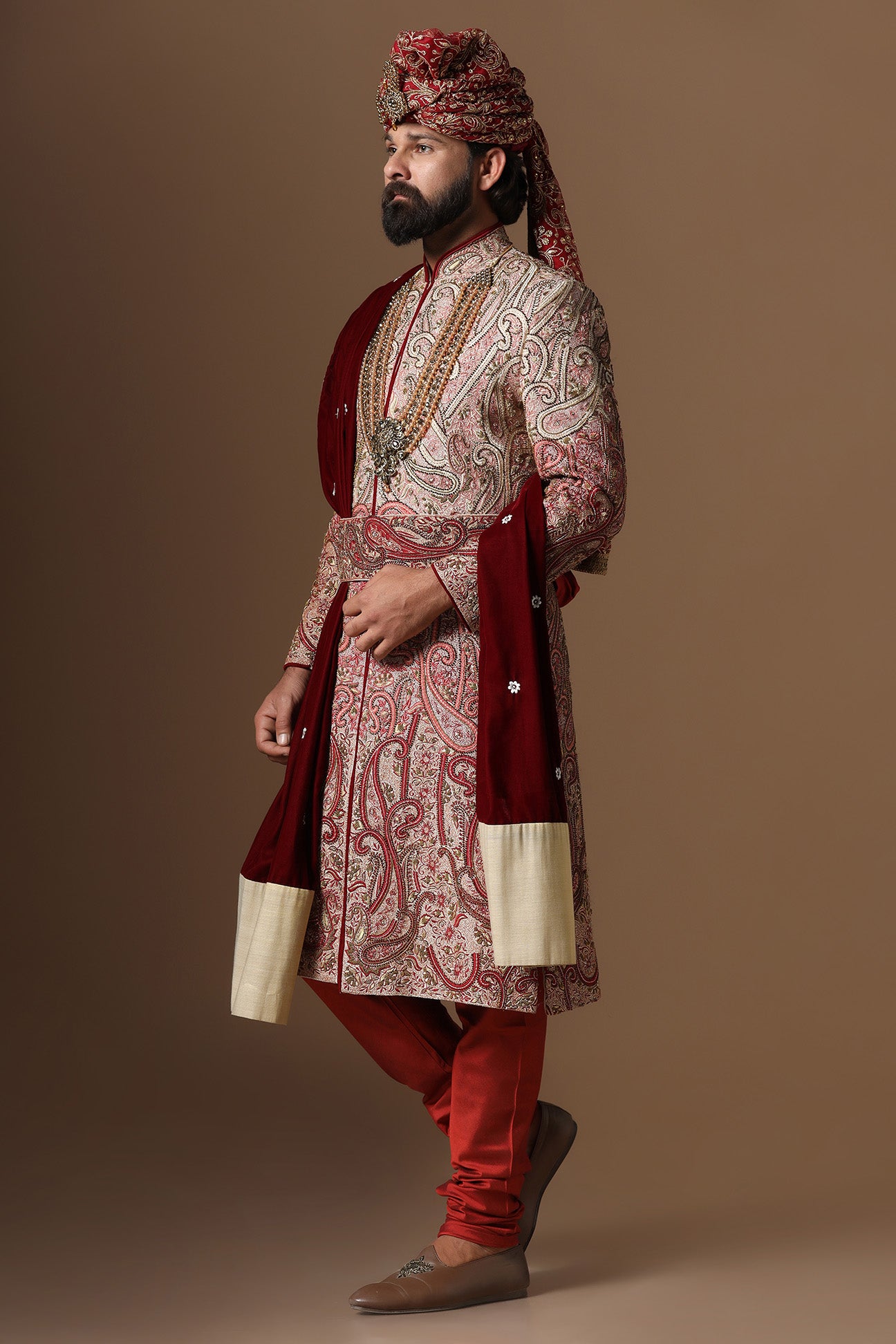 Elevate your style with our ombre embroidered Sherwani, merging Beige and Maroon tones. Shop Now!