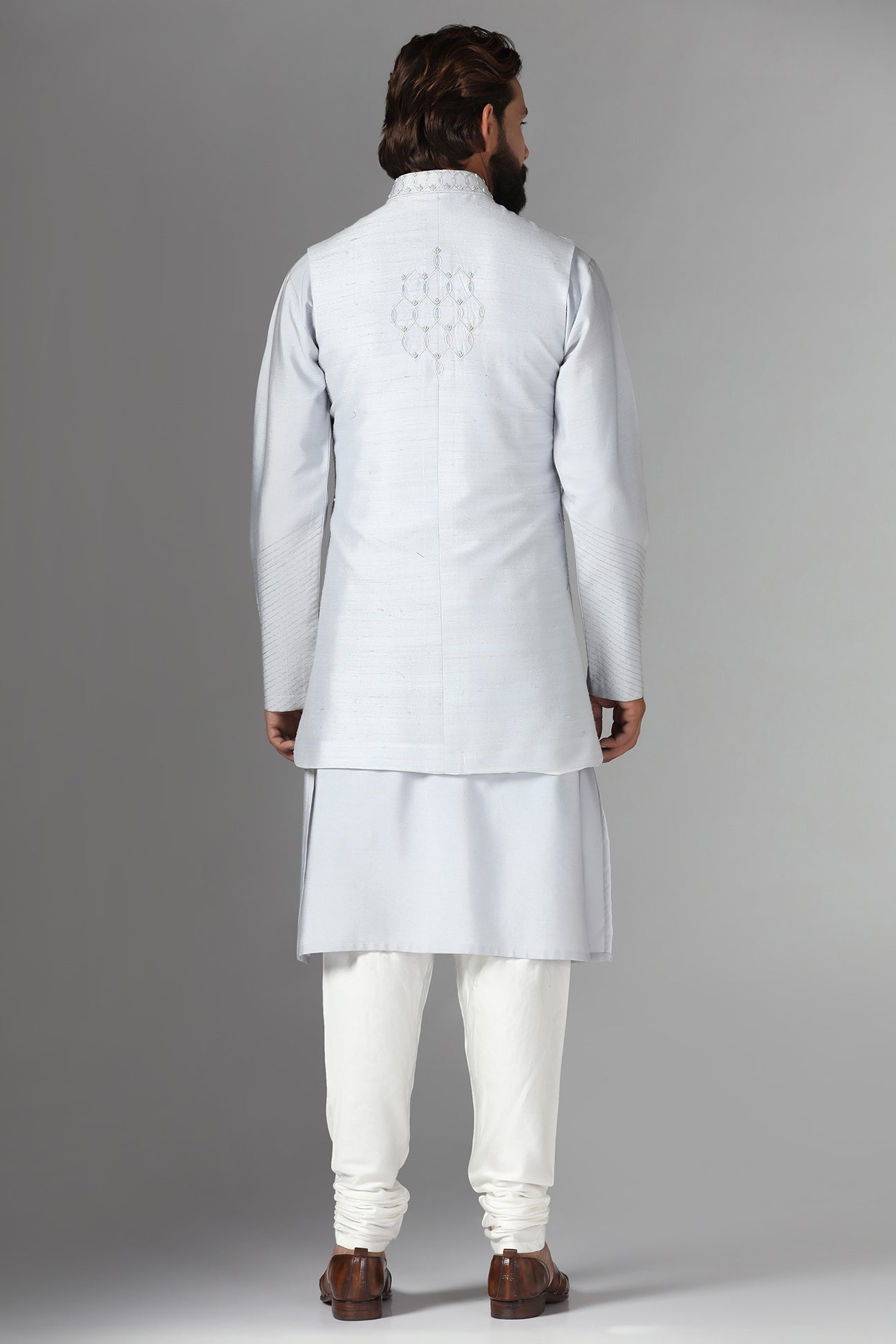 Elevate your style with our long grey raw silk Nehru Jacket. Shop Now!