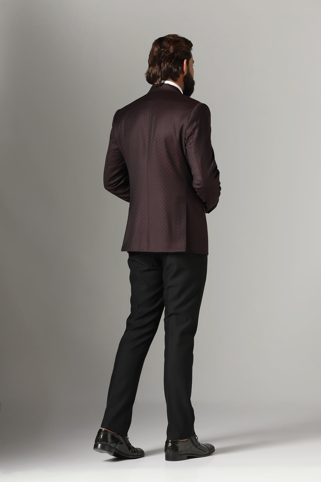 Elevate your style with our Wine-Textured Tuxedo. Shop Now!