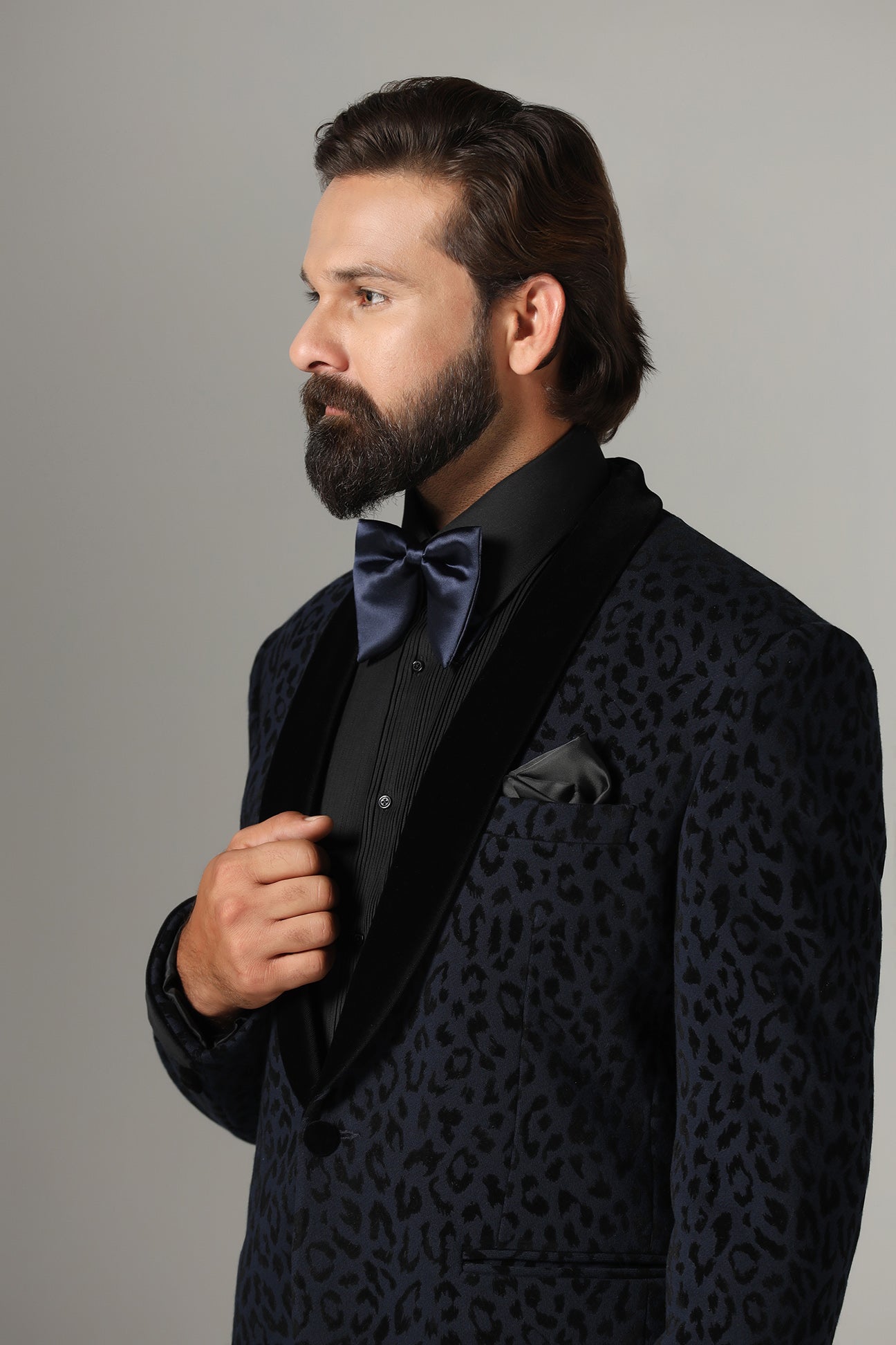 Distinguished elegance in our Textured Navy Blue Tuxedo. Shop Now!