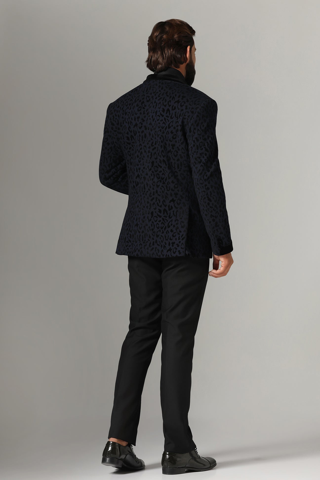 Distinguished elegance in our Textured Navy Blue Tuxedo. Shop Now!