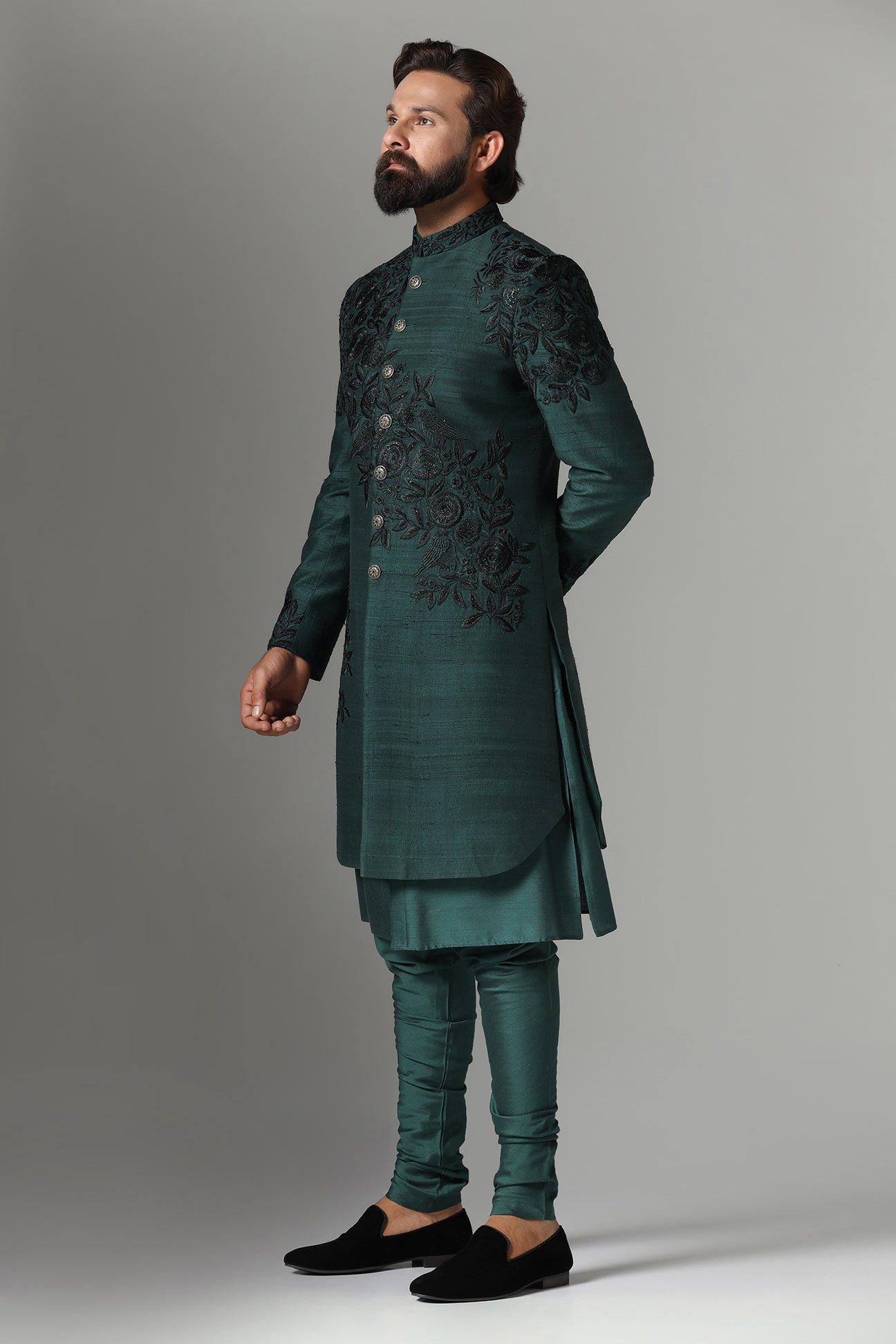 This green Indo-Western features tonal embroidery on the garment. Shop Now!