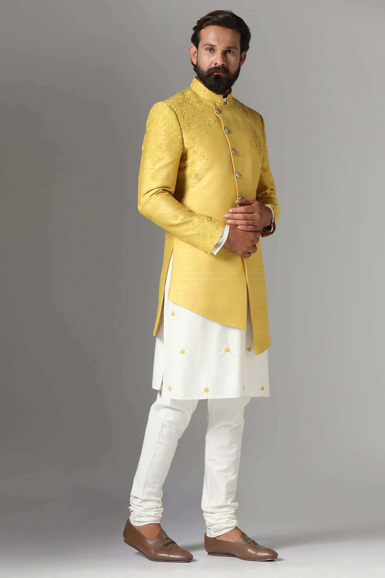 This Yellow Indo-western features subtle embroidery on the garment. Shop Now!