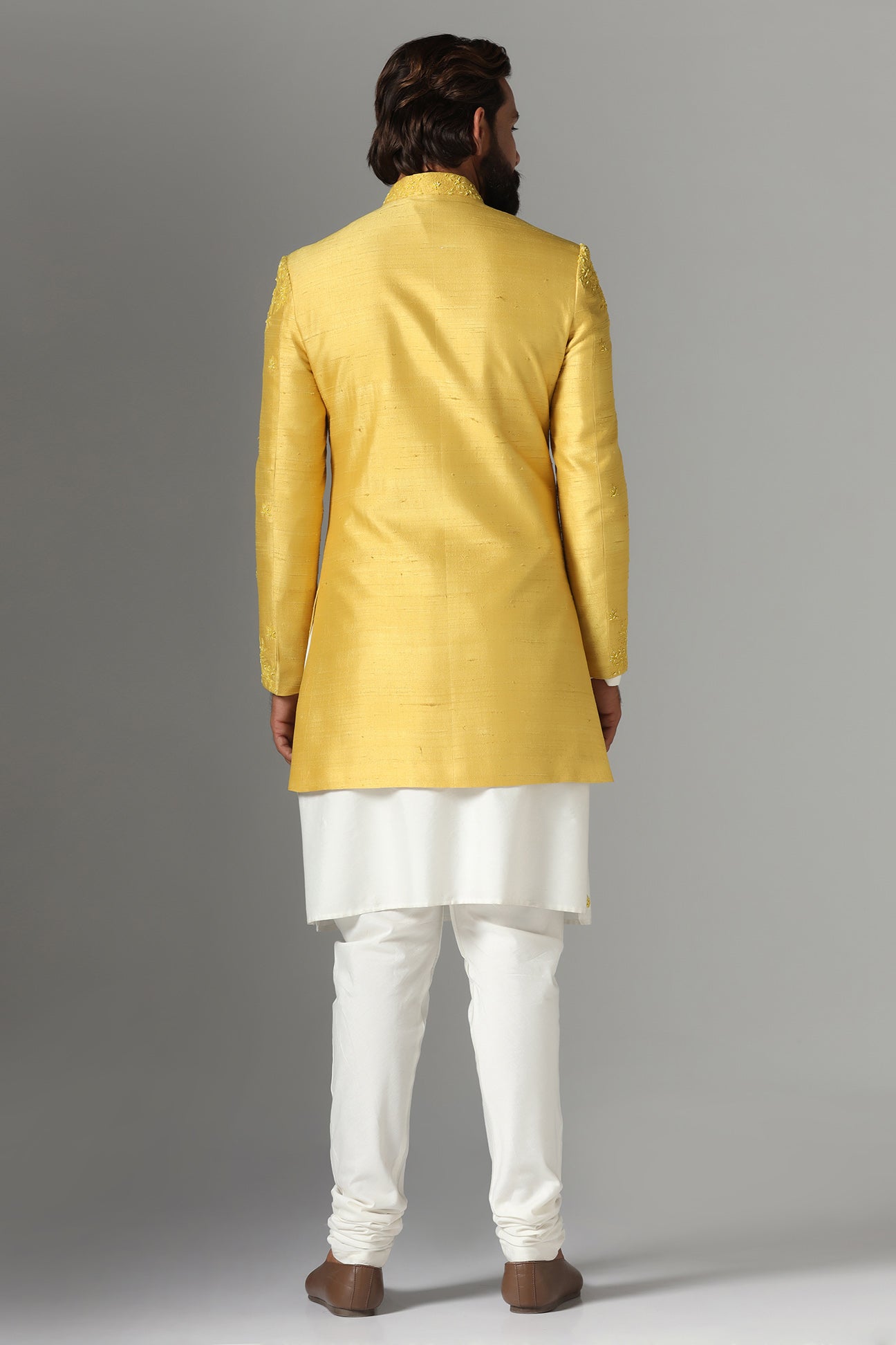 This Yellow Indo-western features subtle embroidery on the garment. Shop Now!