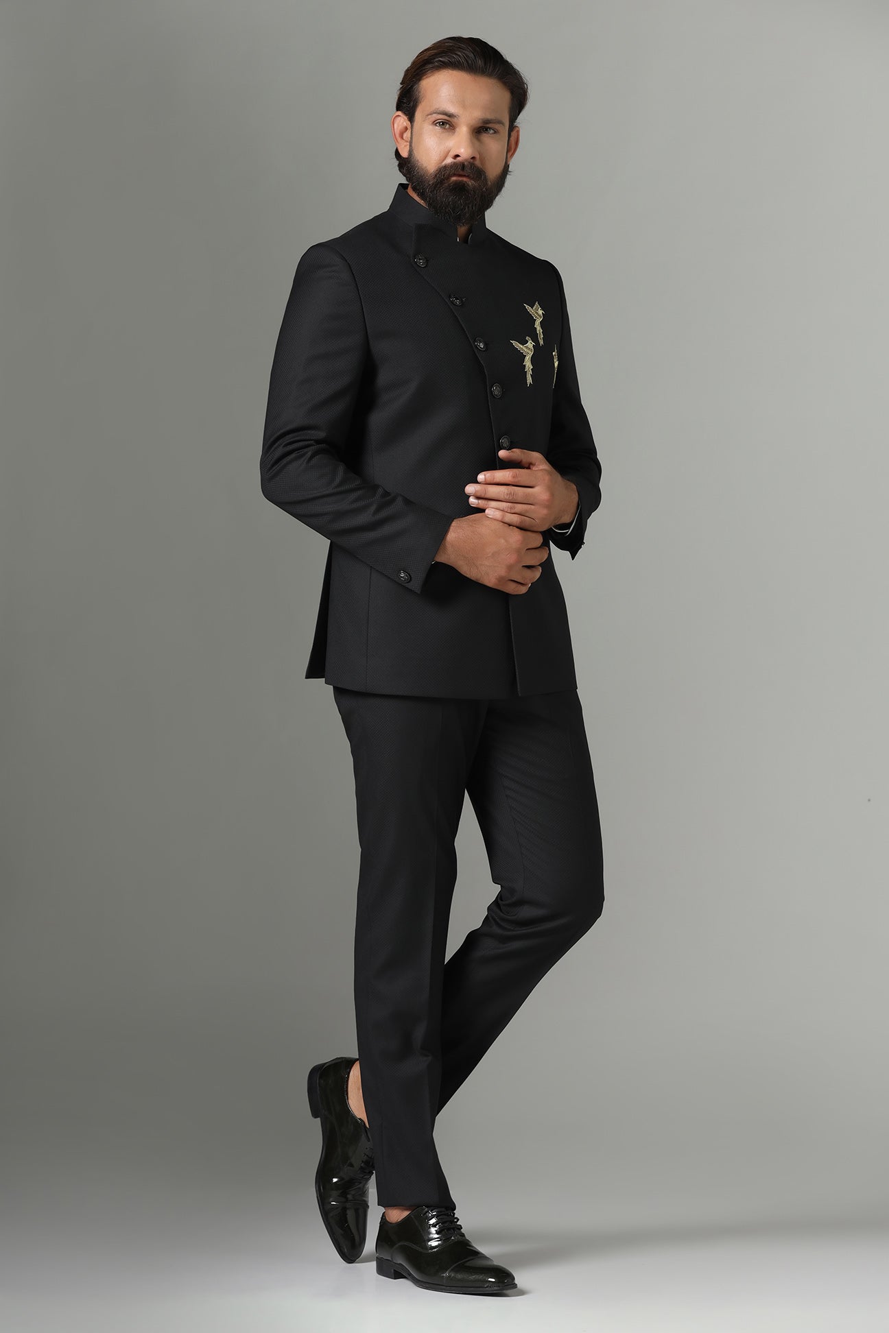 Asymmetric Black Bandhgala suit crafted from wool-rich fabric. Shop now!