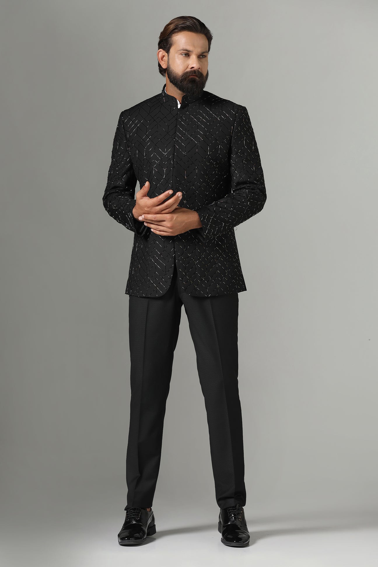 Shop the classic black Bandhgala suit with intricate embroidery for a sophisticated look. Shop now!