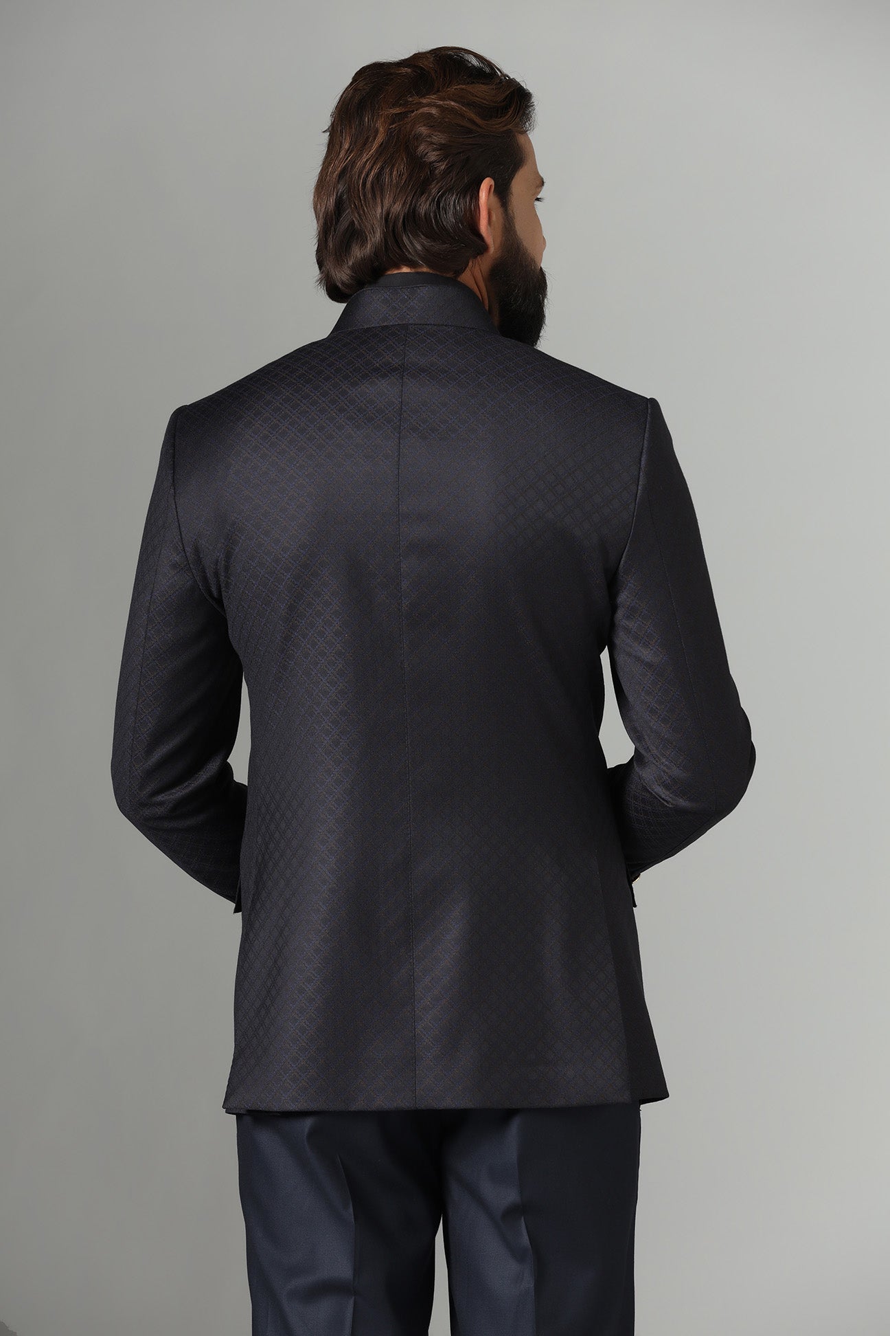 Shop the timeless Bandhgala suit in black for a sleek, elegant look. Shop now!