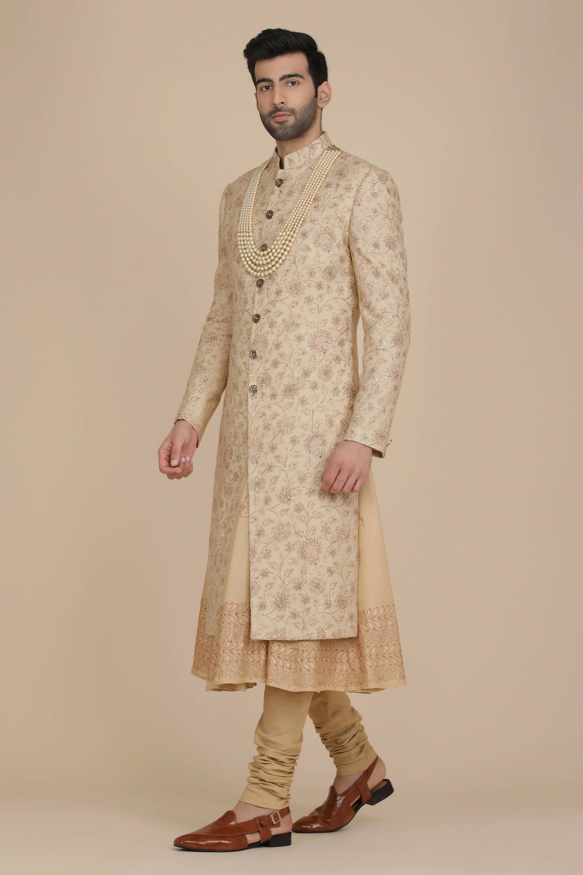 Exquisite floral embroidery adorns this Sherwani. Shop Now!