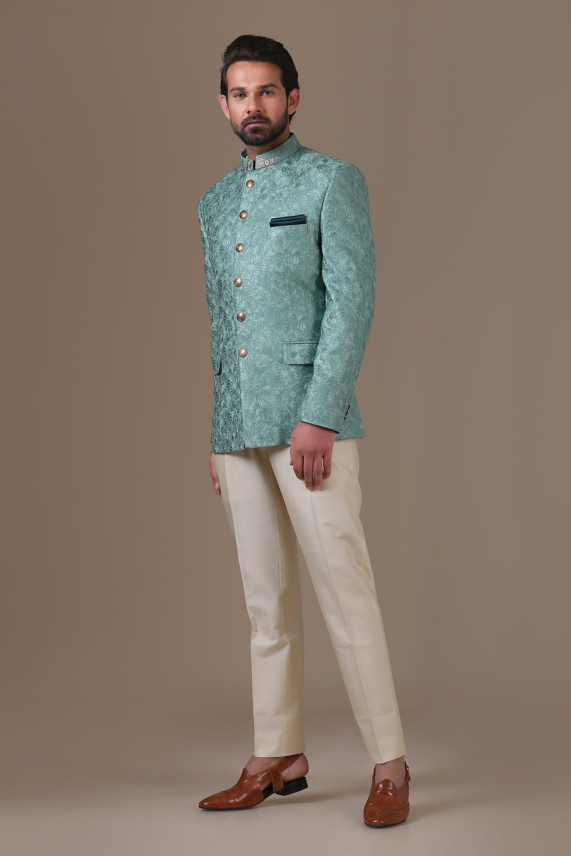 Elevate your style with the mint green embroidered Bandhgala suit. Shop now!