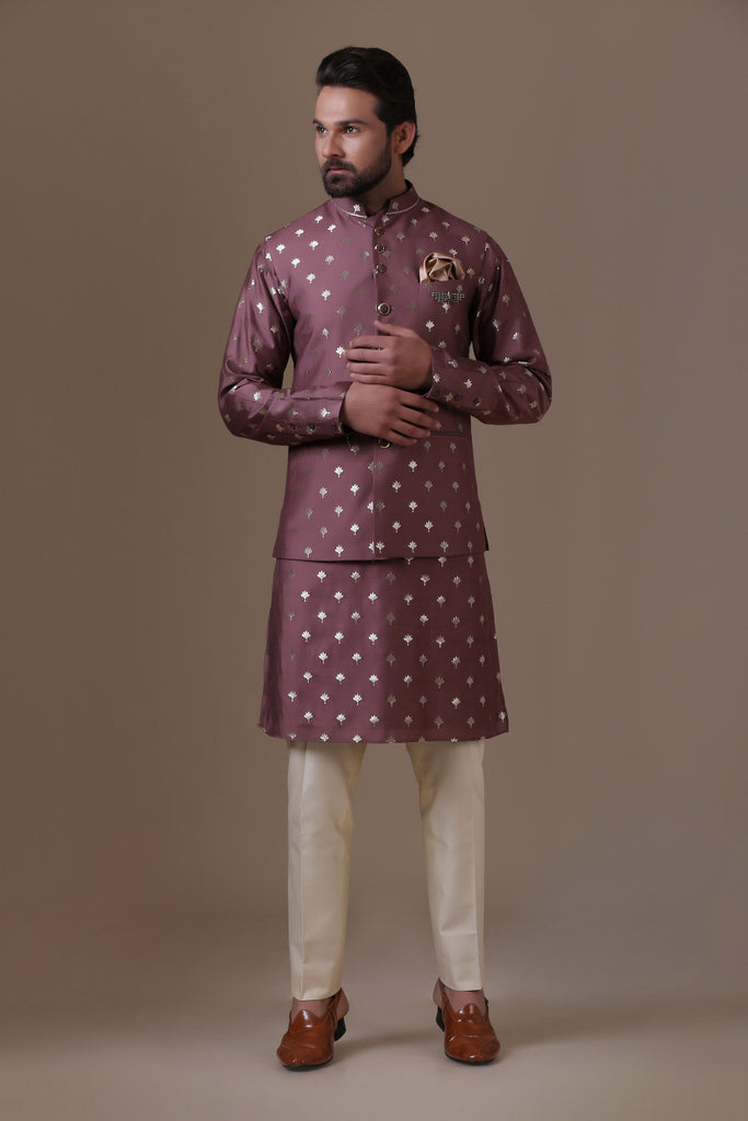 Crafted in luxurious raw silk fabric, our Nehru coat pairs with cotton trousers. Shop Now!