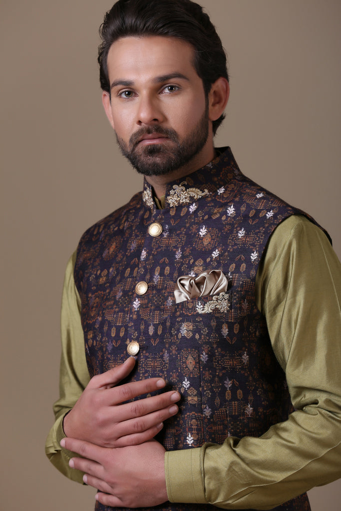 Crafted in luxurious raw silk fabric, our Nehru coat pairs with cotton trousers. Shop Now!