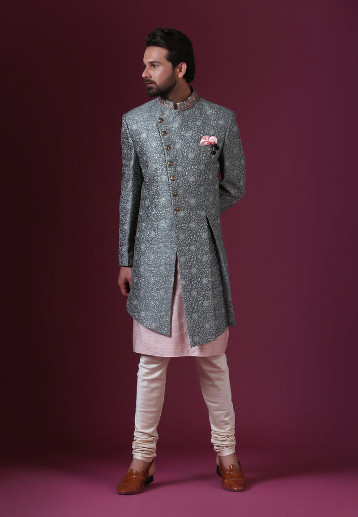 Light Green embroidered Indo-Western with a modern, asymmetric cut. Shop Now!