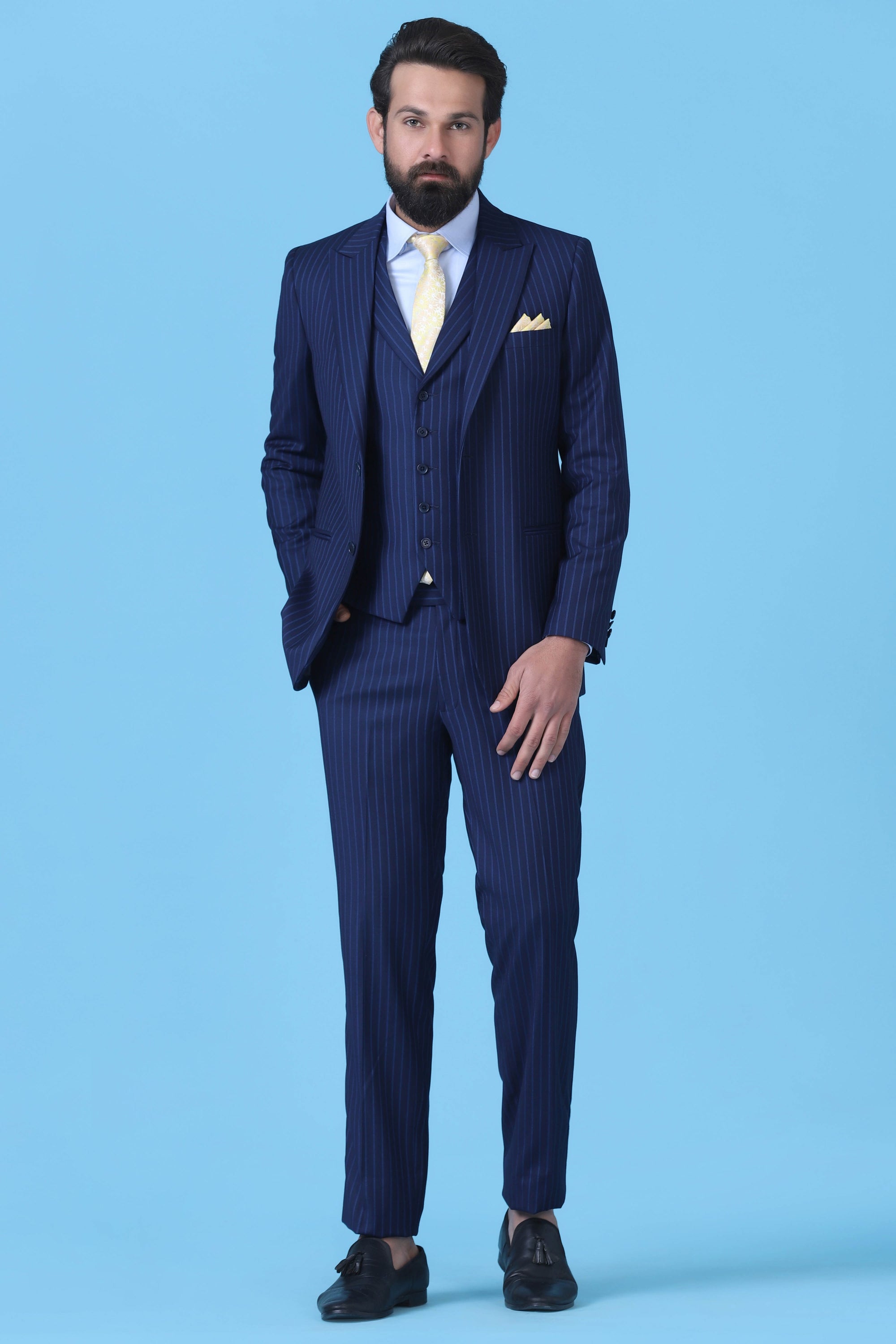 Elevate your style with our bold Pinstripe Suit. Shop Now!