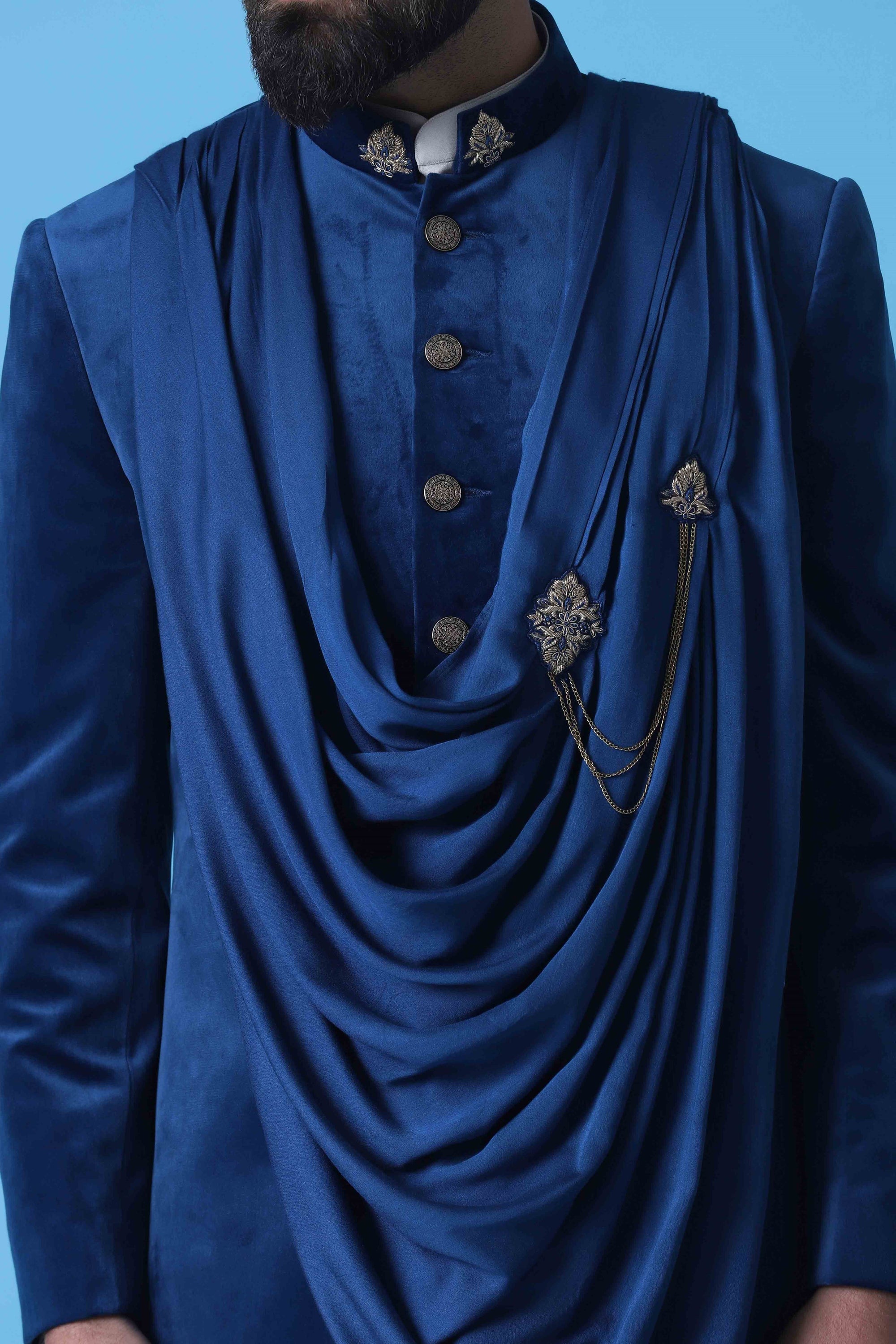 Make a statement in this Blue Velvet Indowestern featuring a stylish drape. Shop Now!