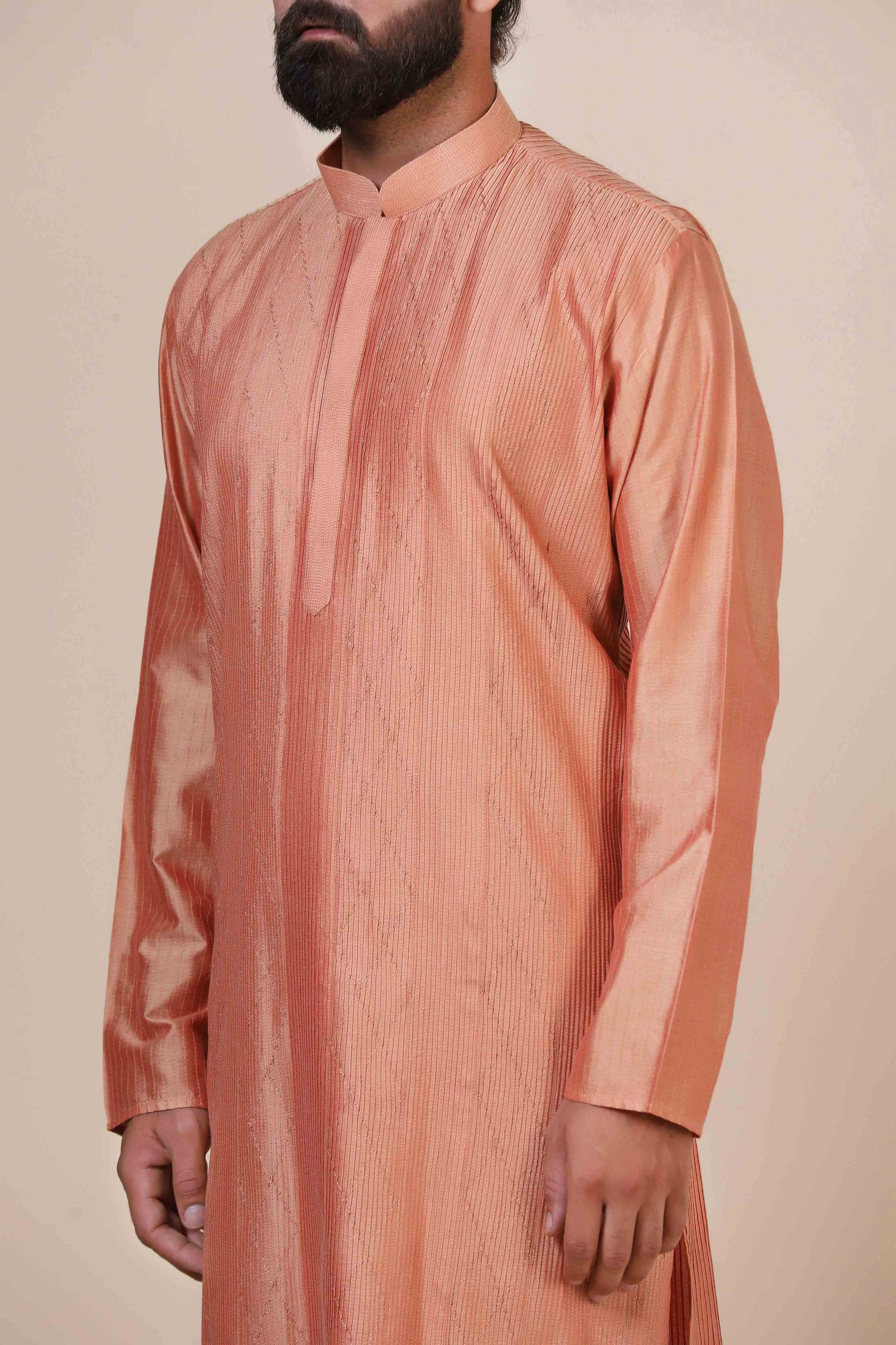 Embrace elegance and comfort in our Peach kurta pajama, tailored from blended cotton. Shop Now!