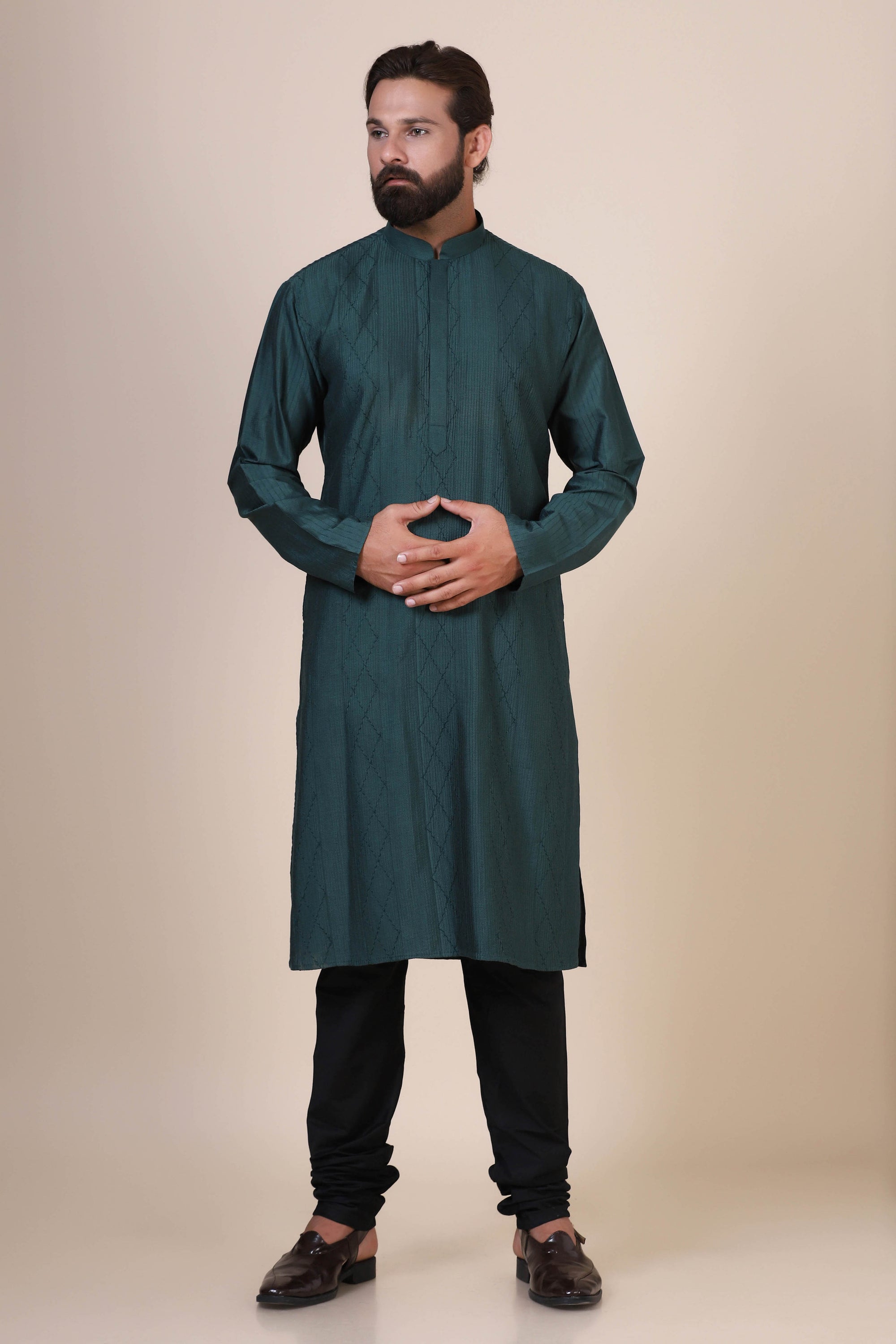Experience comfort in Green kurta pajama, crafted from blended cotton and silk fabric. Shop Now!