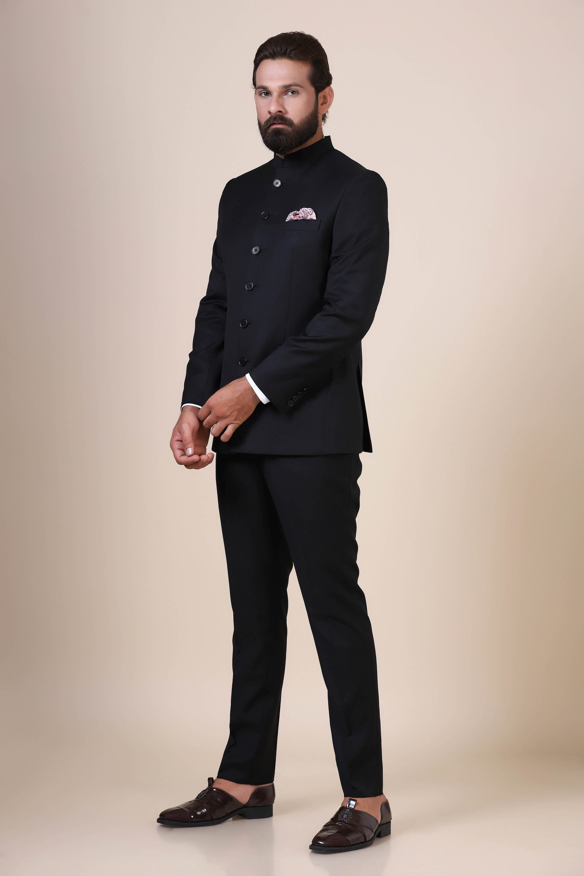 Elevate your style with our Basic Black Bandhgala suit, tailored from wool-rich fabric. Shop now!