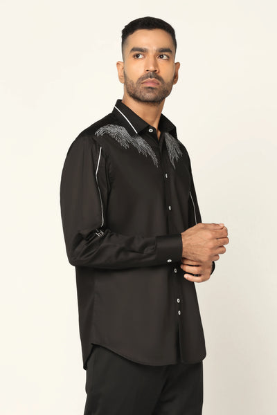Indulge in luxury with our designer shirt crafted from 100% Giza cotton. Classic black adorned with contrast white thread embroidery on the chest and sleeves.