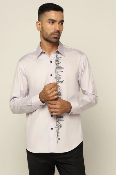 Crafted from 100% Giza cotton, this shirt showcases elegant contrast embroidery around the button placket for added flair.