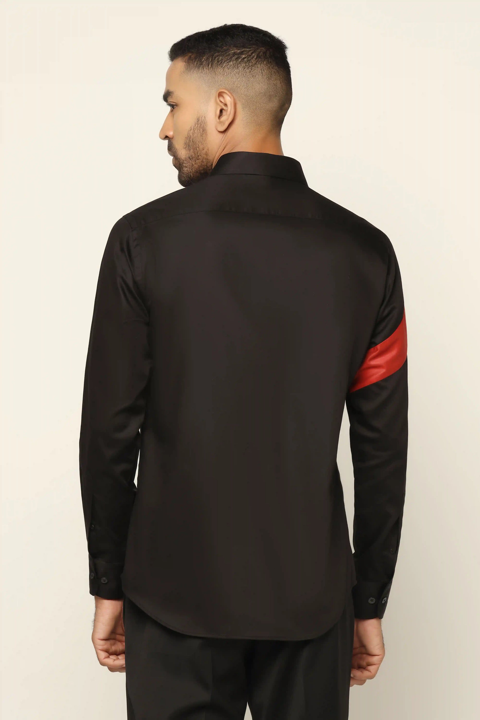 Elevate your style effortlessly with our sleek black designer shirt. Shop Now!