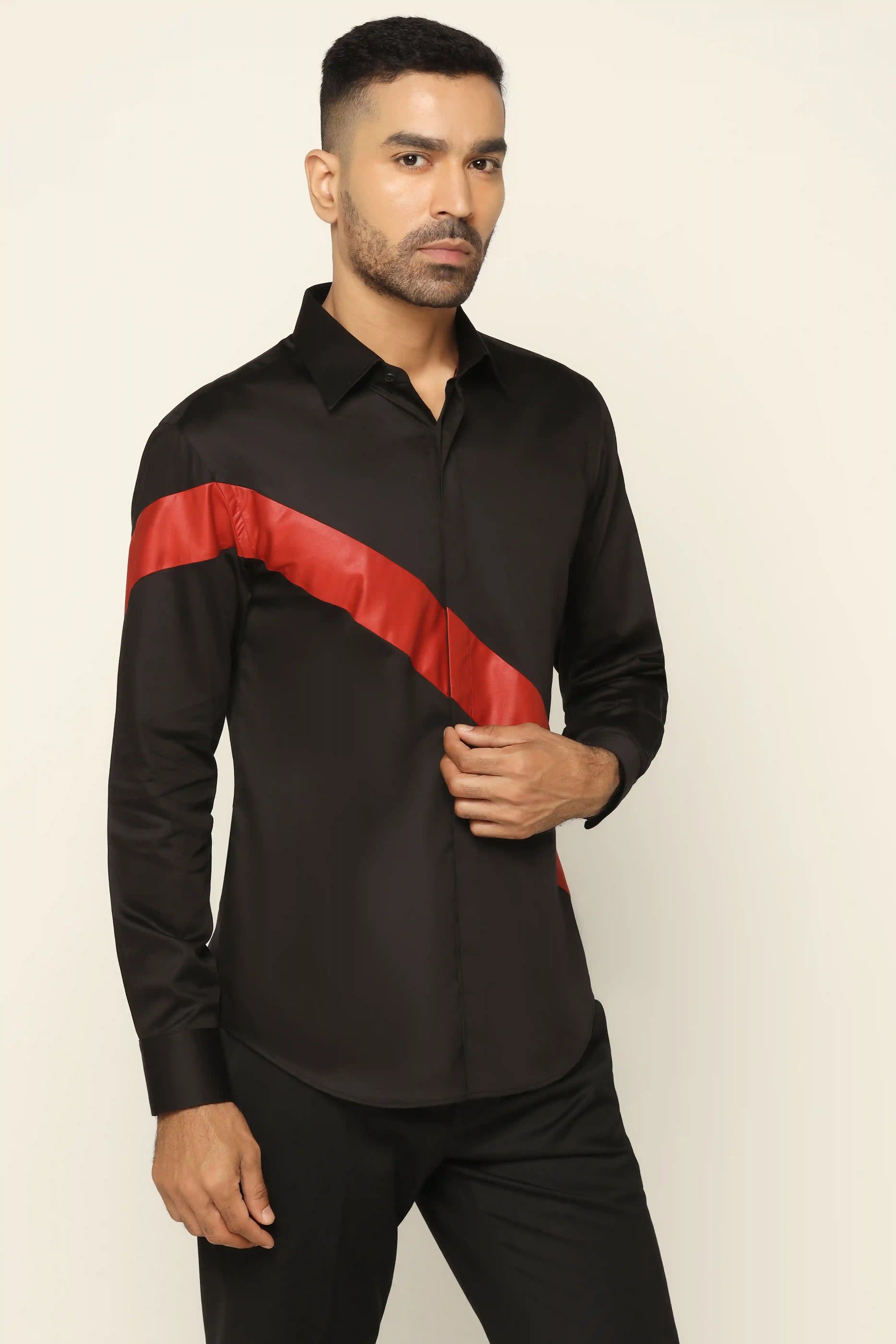 Elevate your style effortlessly with our sleek black designer shirt. Shop Now!