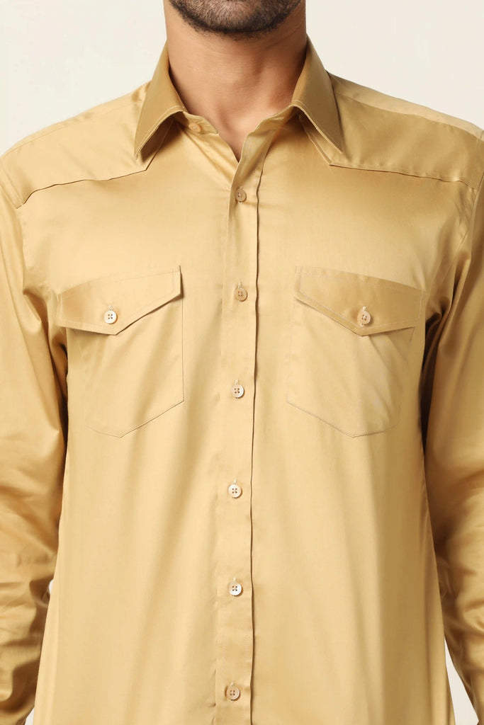 Elevate your look with our Beige shirt featuring double pockets on the chests. Crafted from 100% Giza Cotton, it boasts a regular collar and matching buttons.