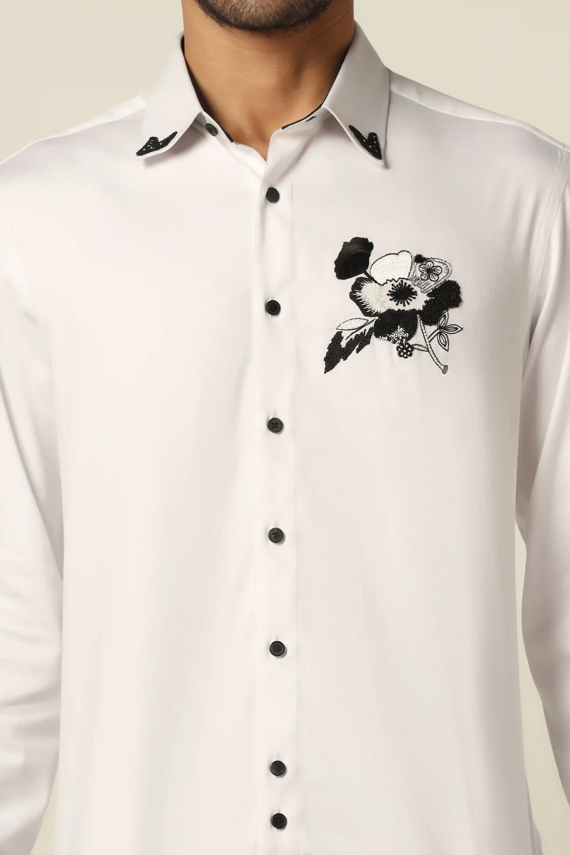 Elevate your fashion game with this premium white designer shirt. Shop Now!
