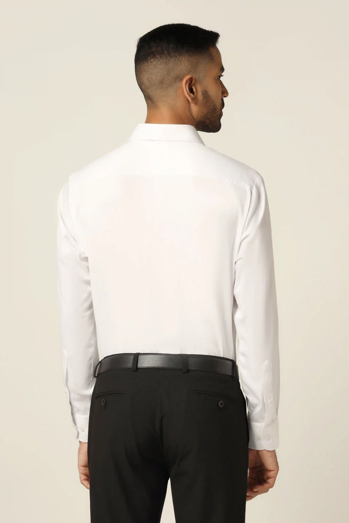 Elevate your formal attire with our contemporary tuxedo shirt. Crafted from solid white fabric, featuring a cube-like pattern embroidered in black thread.
