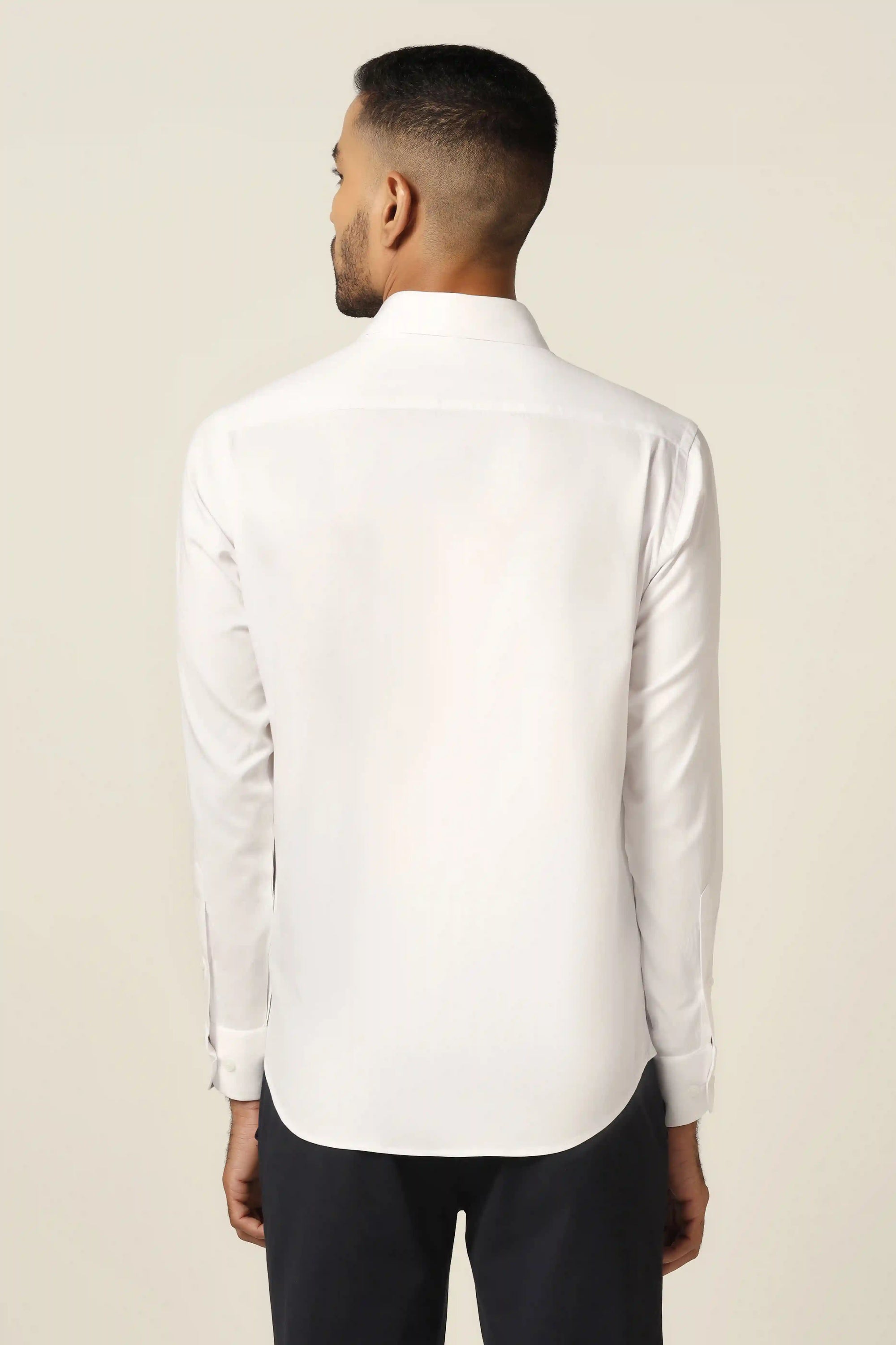 Experience timeless elegance with our white designer shirt. Shop Now!
